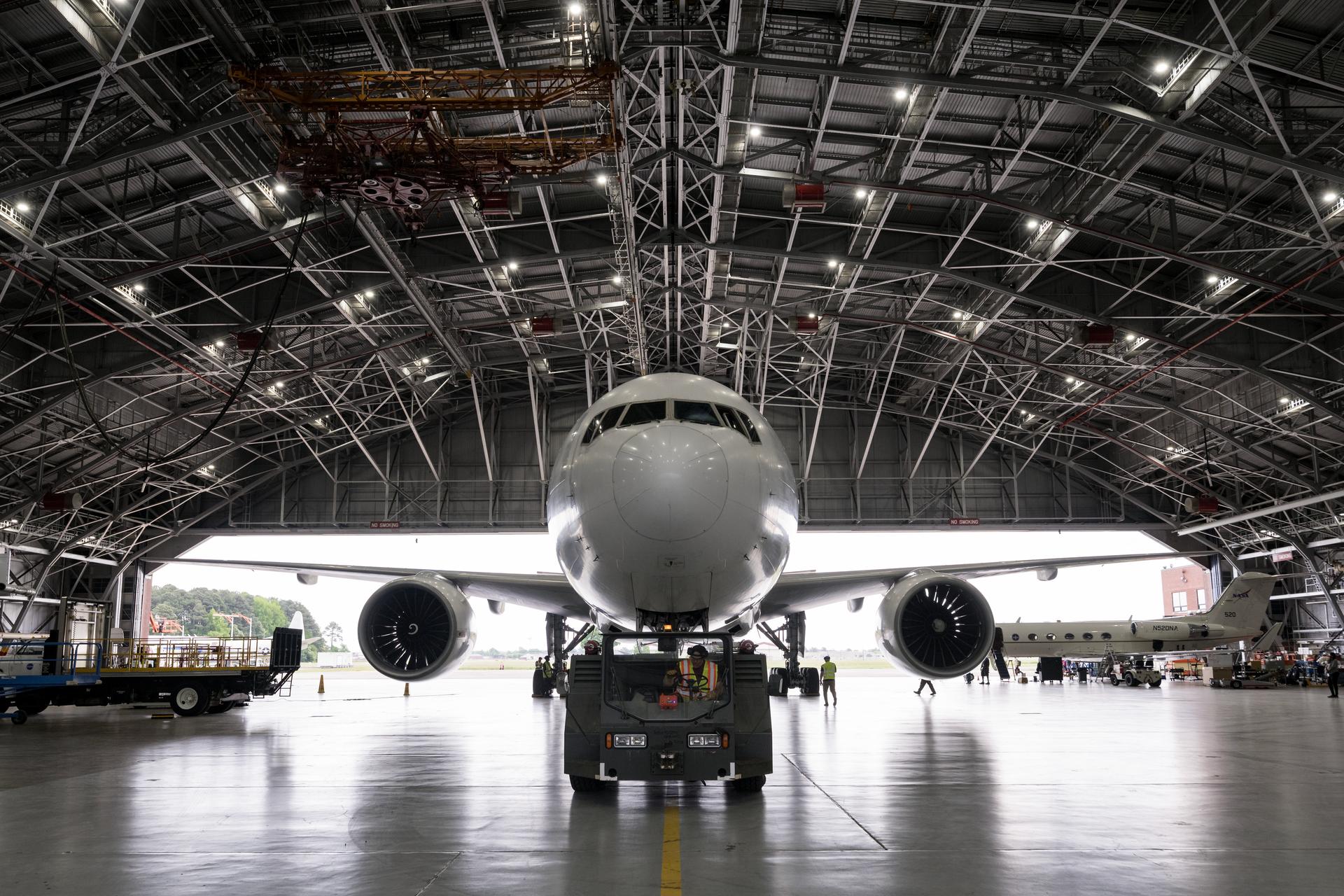 NASA Langley's B777 aircraft before it departs Langley Research Center to receive its new livery (paint job), prior to its departure on July 16th, it received ground maintenance in the center’s hangar. (Photo Credit NASA/ Mark Knopp)
