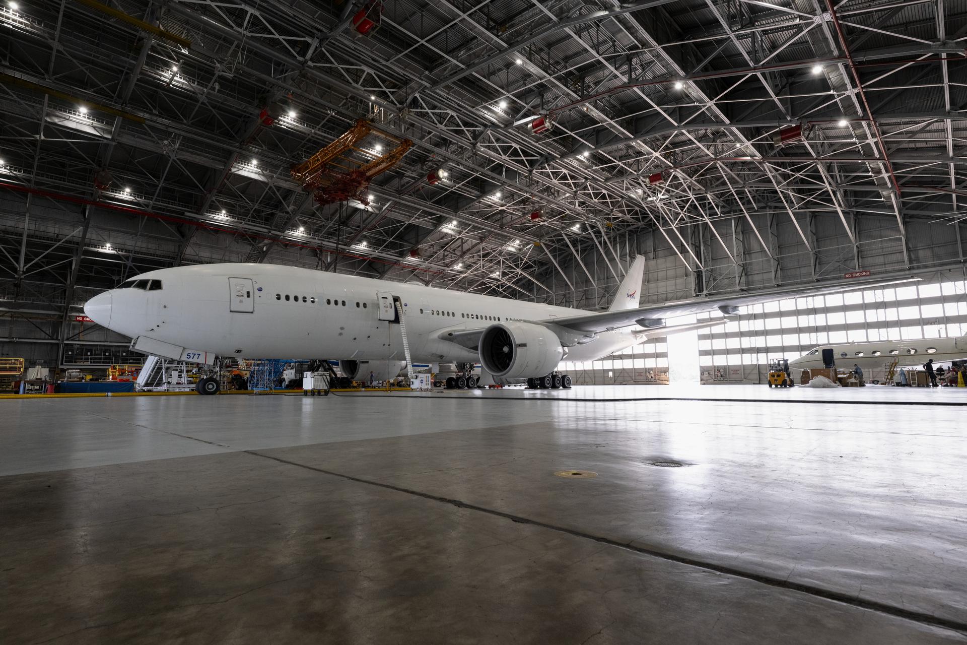 NASA Langley's B777 aircraft before it departs Langley Research Center to receive its new livery (paint job), prior to its departure on July 16th, it received ground maintenance in the center’s hangar. (Photo Credit NASA/ Ryan Hill)