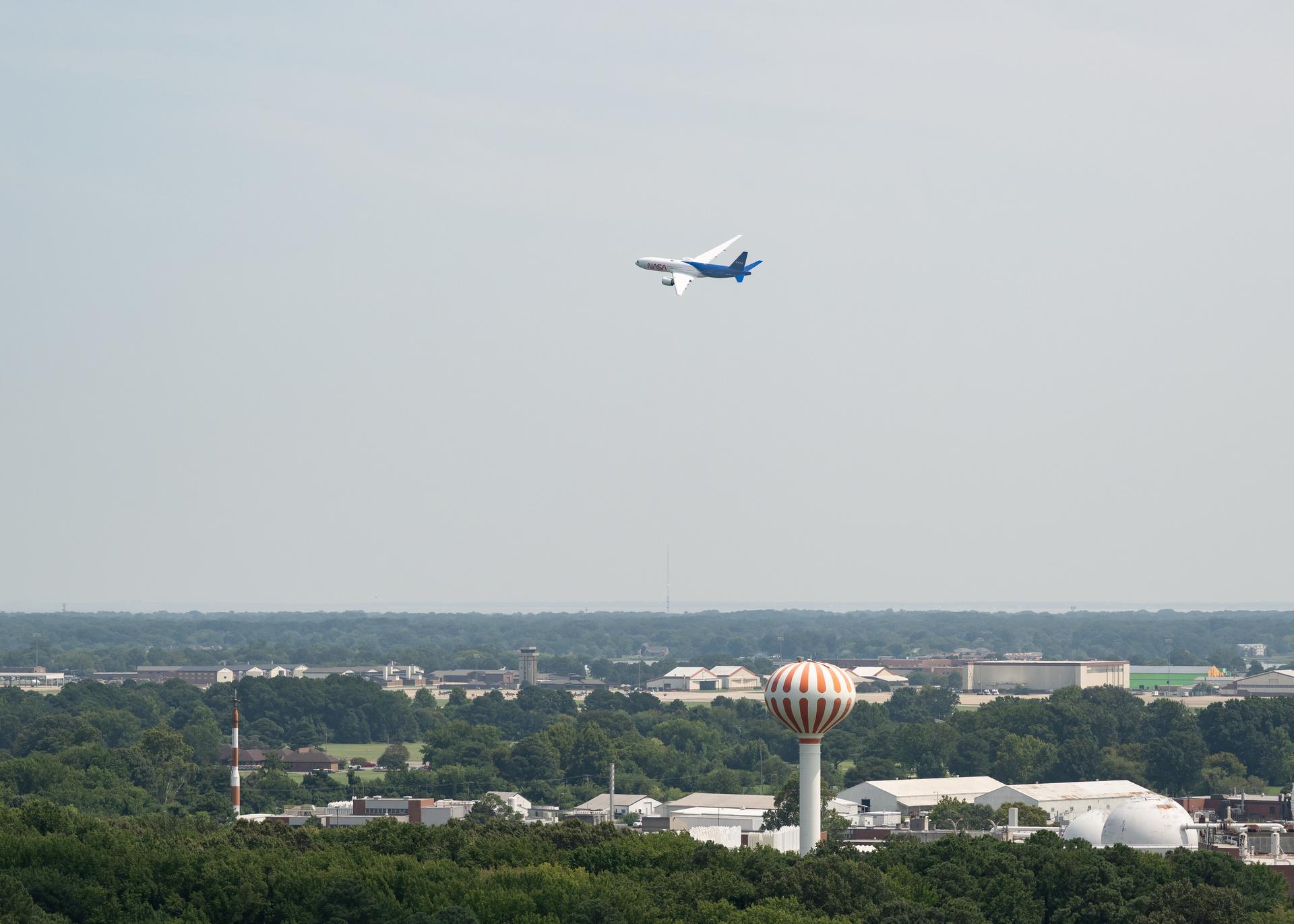 NASA's B777 aircraft returning to NASA Langley Research Center the 31st of July in Hampton, Virginia after a new paint job. It will now continue its maintenance and instrument integration schedule to prepare for its initial airborne science flights in 2027. Photo Credit NASA/ Ryan Hill)