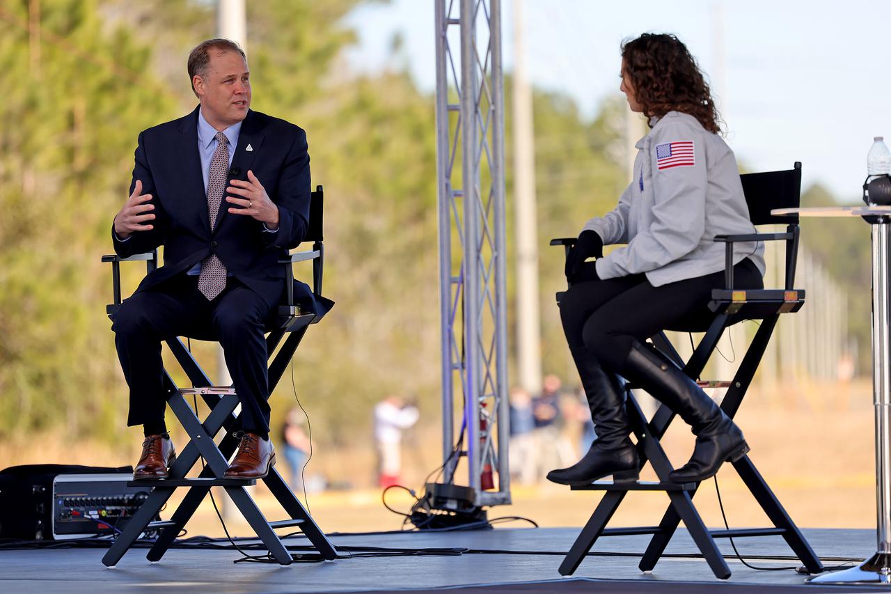 Outgoing NASA Administrator Jim Bridenstine (left) talks with host Leigh D’Angelo during NASA TV live coverage from Stennis Space Center near Bay St. Louis, Mississippi, on Jan. 16, 2021. D’Angelo, from NASA’s Michoud Assembly Facility in nearby New Orleans, hosted the NASA TV coverage prior to the hot fire test of the core stage for the agency’s Space Launch System rocket. The hot fire test of the stage’s four RS-25 engines generated a combined 1.6 million pounds of thrust, just as will occur during an actual launch. The hot fire is the final test of the Green Run test series, a comprehensive assessment of the SLS core stage prior to launching the Artemis I mission to the Moon.
