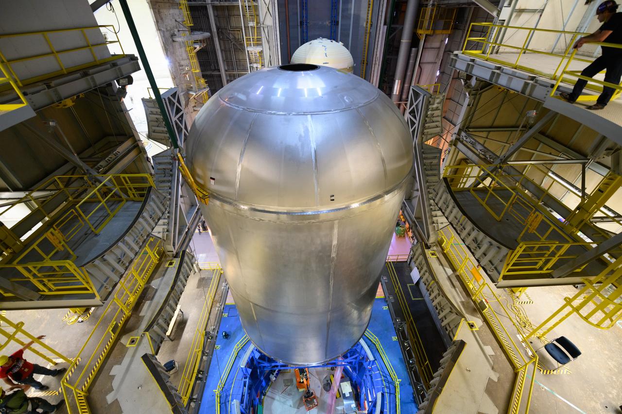 Space Launch System Corestage-2 (Artemis-2) Liquid Oxygen tank is lifted out a of a work cell at NASA's Michoud Assembly Facility.