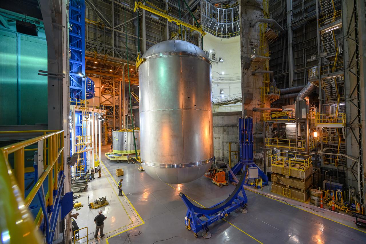 Space Launch System Corestage-2 (Artemis-2) Liquid Oxygen tank is lifted out a of a work cell at NASA's Michoud Assembly Facility.