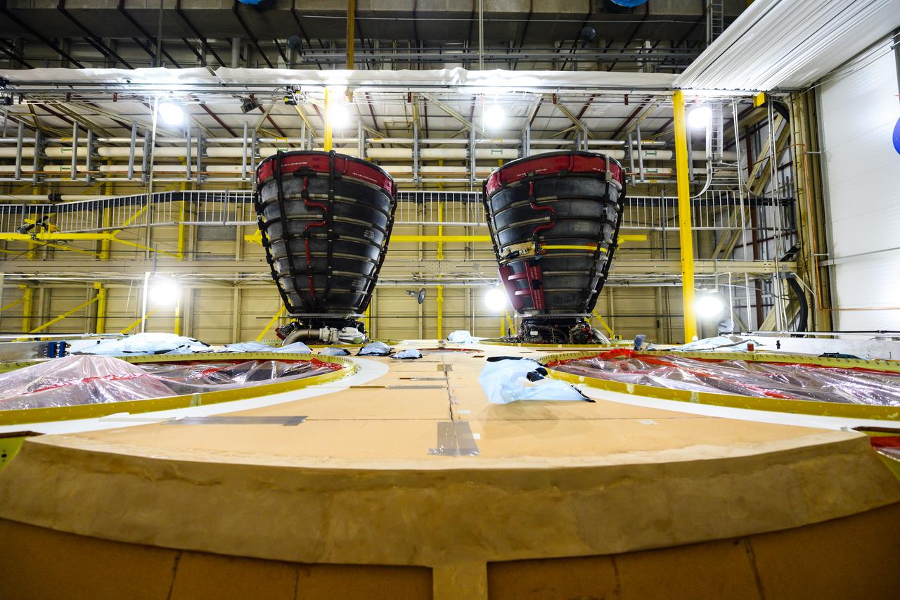 The second RS-25 engine has been attached to the core stage for NASA’s Space Launch System (SLS) rocket for the agency’s Artemis missions. Engineers and technicians at NASA’s Michoud Assembly Facility in New Orleans structurally mated the second of four engines to the stage on Oct. 30 and are currently integrating the propulsion and electrical systems within the structure to complete the installation. Integration of the RS-25 engines to the recently completed core stage structure is a collaborative, multistep process for NASA and its partners Boeing, the core stage lead contractor, and Aerojet Rocketdyne, the RS-25 engines lead contractor. The four RS-25 engines for Artemis I are modified heritage flight hardware from the Space Shuttle Program, ensuring high performance and reliability to power NASA’s next generation lunar missions. Each engine also has a special identification number, and NASA keeps a history of which engines are used on each mission. The second engine, Engine 2045, has flown on several shuttle missions, including the mission that returned NASA astronaut John Glenn to space in 1998 as well as the first and only shuttle launch to occur on Independence Day in 2006.  NASA is working to land the first woman and next man on the Moon by 2024. SLS is part of NASA’s backbone for deep space exploration, along with Orion and the Gateway in orbit around the Moon. SLS is the only rocket that can send Orion, astronauts and supplies to the Moon on a single mission.