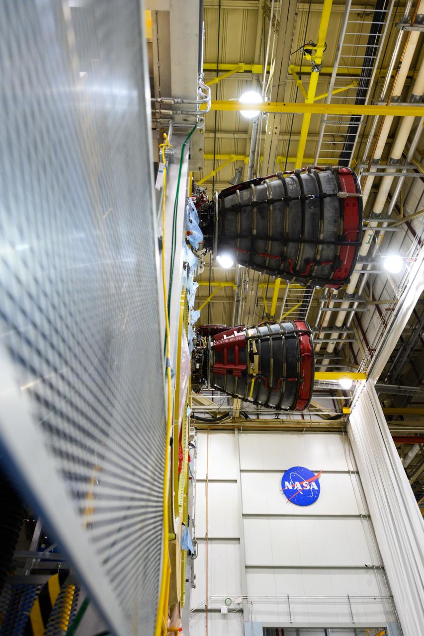 The second RS-25 engine has been attached to the core stage for NASA’s Space Launch System (SLS) rocket for the agency’s Artemis missions. Engineers and technicians at NASA’s Michoud Assembly Facility in New Orleans structurally mated the second of four engines to the stage on Oct. 30 and are currently integrating the propulsion and electrical systems within the structure to complete the installation. Integration of the RS-25 engines to the recently completed core stage structure is a collaborative, multistep process for NASA and its partners Boeing, the core stage lead contractor, and Aerojet Rocketdyne, the RS-25 engines lead contractor. The four RS-25 engines for Artemis I are modified heritage flight hardware from the Space Shuttle Program, ensuring high performance and reliability to power NASA’s next generation lunar missions. Each engine also has a special identification number, and NASA keeps a history of which engines are used on each mission. The second engine, Engine 2045, has flown on several shuttle missions, including the mission that returned NASA astronaut John Glenn to space in 1998 as well as the first and only shuttle launch to occur on Independence Day in 2006.  NASA is working to land the first woman and next man on the Moon by 2024. SLS is part of NASA’s backbone for deep space exploration, along with Orion and the Gateway in orbit around the Moon. SLS is the only rocket that can send Orion, astronauts and supplies to the Moon on a single mission.