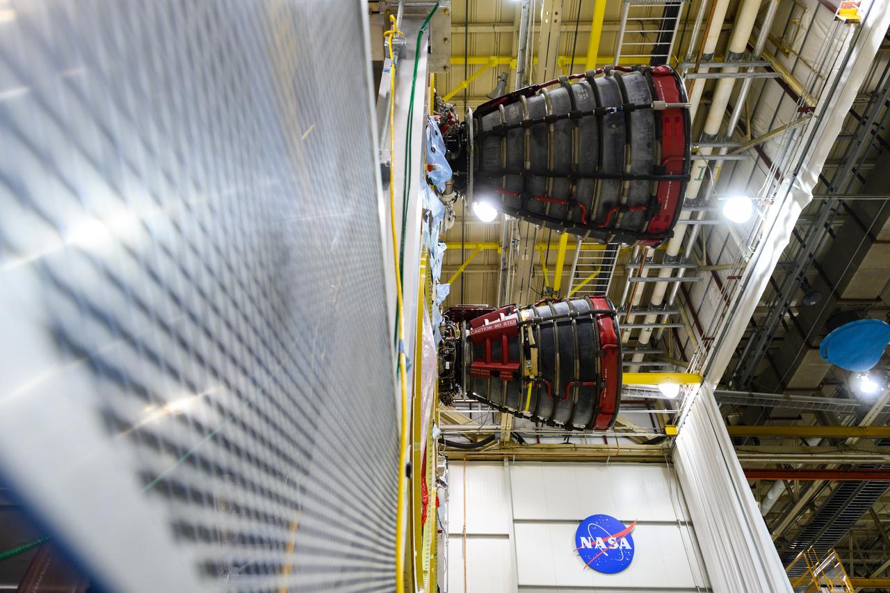 The second RS-25 engine has been attached to the core stage for NASA’s Space Launch System (SLS) rocket for the agency’s Artemis missions. Engineers and technicians at NASA’s Michoud Assembly Facility in New Orleans structurally mated the second of four engines to the stage on Oct. 30 and are currently integrating the propulsion and electrical systems within the structure to complete the installation. Integration of the RS-25 engines to the recently completed core stage structure is a collaborative, multistep process for NASA and its partners Boeing, the core stage lead contractor, and Aerojet Rocketdyne, the RS-25 engines lead contractor. The four RS-25 engines for Artemis I are modified heritage flight hardware from the Space Shuttle Program, ensuring high performance and reliability to power NASA’s next generation lunar missions. Each engine also has a special identification number, and NASA keeps a history of which engines are used on each mission. The second engine, Engine 2045, has flown on several shuttle missions, including the mission that returned NASA astronaut John Glenn to space in 1998 as well as the first and only shuttle launch to occur on Independence Day in 2006.  NASA is working to land the first woman and next man on the Moon by 2024. SLS is part of NASA’s backbone for deep space exploration, along with Orion and the Gateway in orbit around the Moon. SLS is the only rocket that can send Orion, astronauts and supplies to the Moon on a single mission.