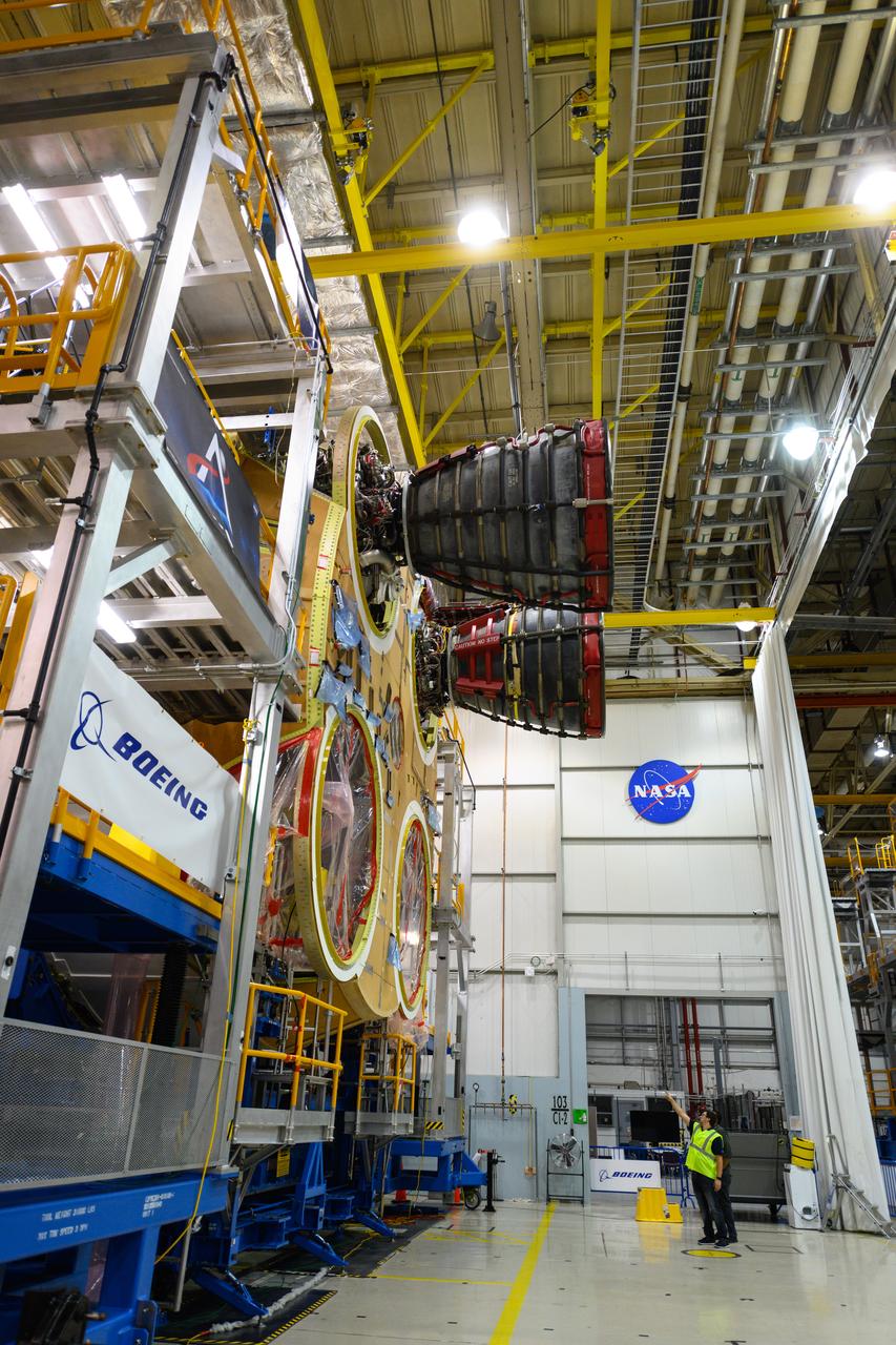 The second RS-25 engine has been attached to the core stage for NASA’s Space Launch System (SLS) rocket for the agency’s Artemis missions. Engineers and technicians at NASA’s Michoud Assembly Facility in New Orleans structurally mated the second of four engines to the stage on Oct. 30 and are currently integrating the propulsion and electrical systems within the structure to complete the installation. Integration of the RS-25 engines to the recently completed core stage structure is a collaborative, multistep process for NASA and its partners Boeing, the core stage lead contractor, and Aerojet Rocketdyne, the RS-25 engines lead contractor. The four RS-25 engines for Artemis I are modified heritage flight hardware from the Space Shuttle Program, ensuring high performance and reliability to power NASA’s next generation lunar missions. Each engine also has a special identification number, and NASA keeps a history of which engines are used on each mission. The second engine, Engine 2045, has flown on several shuttle missions, including the mission that returned NASA astronaut John Glenn to space in 1998 as well as the first and only shuttle launch to occur on Independence Day in 2006.  NASA is working to land the first woman and next man on the Moon by 2024. SLS is part of NASA’s backbone for deep space exploration, along with Orion and the Gateway in orbit around the Moon. SLS is the only rocket that can send Orion, astronauts and supplies to the Moon on a single mission.