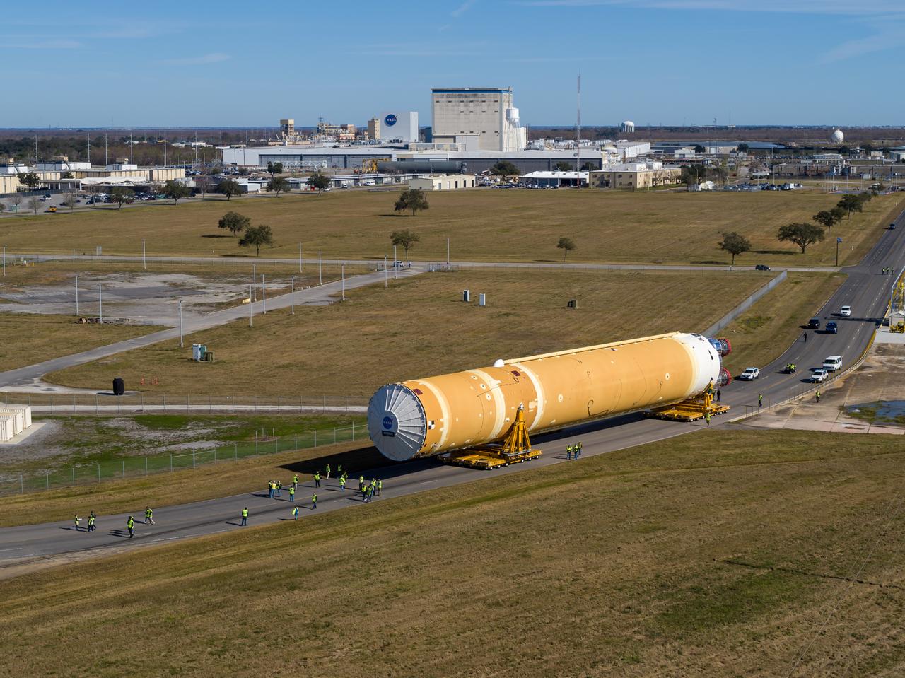 These images/video show how teams rolled out, or moved, the completed core stage for NASA’s Space Launch System rocket from NASA’s Michoud Assembly Facility in New Orleans. Crews moved the flight hardware for the first Artemis mission to NASA’s Pegasus barge on Jan. 8 in preparation for the core stage Green Run test series at NASA’s Stennis Space Center near Bay St. Louis, Mississippi. Pegasus, which was modified to ferry SLS rocket hardware, will transport the core stage from Michoud to Stennis for the comprehensive core stage Green Run test series. Once at Stennis, the Artemis rocket stage will be loaded into the B-2 Test Stand for the core stage Green Run test series. The comprehensive test campaign will progressively bring the entire core stage, including its avionics and engines, to life for the first time to verify the stage is fit for flight ahead of the launch of Artemis I.  Assembly and integration of the core stage and its four RS-25 engines has been a collaborative, multistep process for NASA and its partners Boeing, the core stage lead contractor, and Aerojet Rocketdyne, the RS-25 engines lead contractor. Together with four RS-25 engines, the rocket’s massive 212-foot-tall core stage — the largest stage NASA has ever built — and its twin solid rocket boosters will produce 8.8 million pounds of thrust to send NASA’s Orion spacecraft, astronauts and supplies beyond Earth’s orbit to the Moon and, ultimately, Mars. Offering more payload mass, volume capability and energy to speed missions through space, the SLS rocket, along with NASA’s Gateway in lunar orbit and Orion, is part of NASA’s backbone for deep space exploration and the Artemis lunar program.