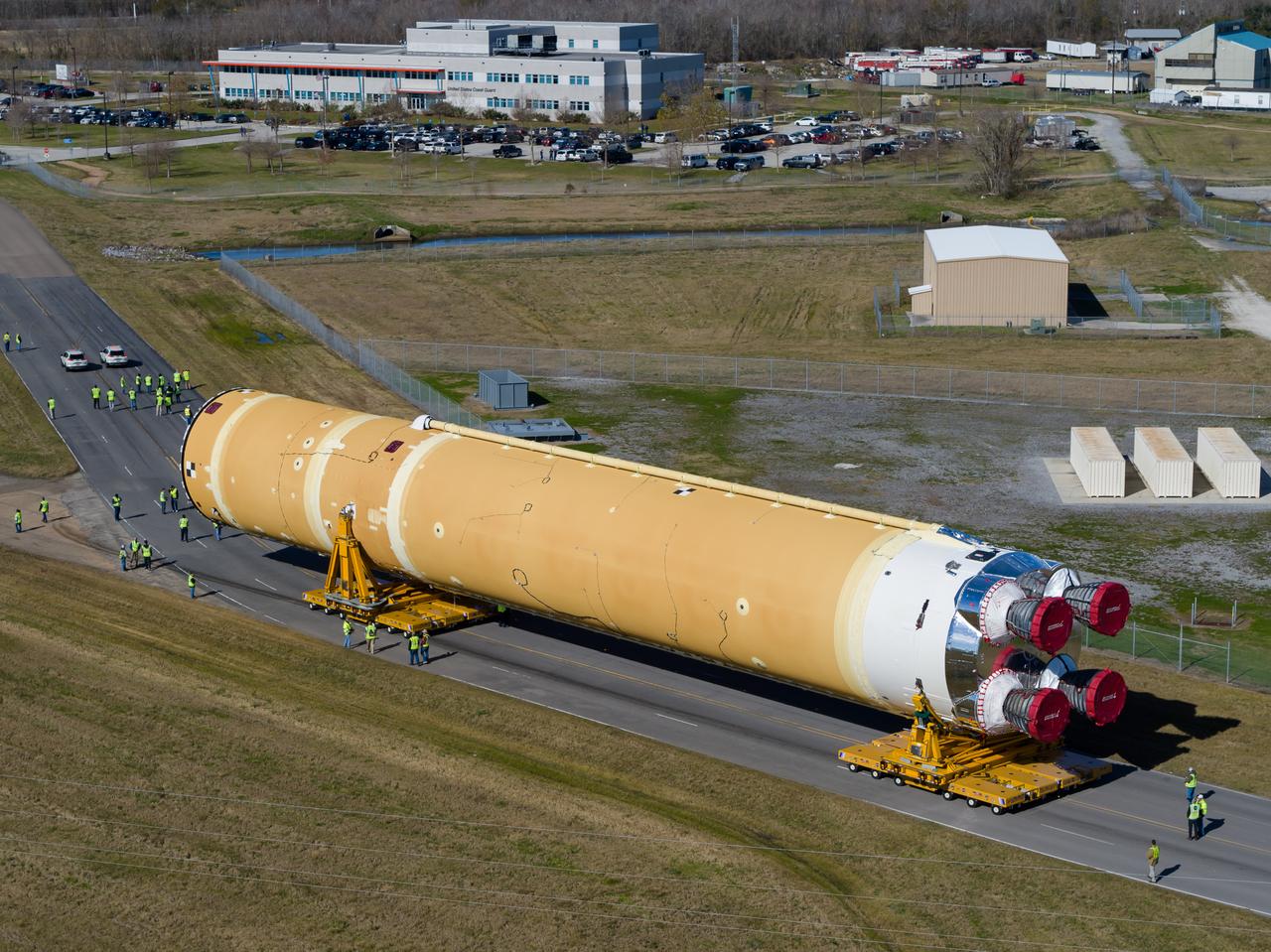 These images/video show how teams rolled out, or moved, the completed core stage for NASA’s Space Launch System rocket from NASA’s Michoud Assembly Facility in New Orleans. Crews moved the flight hardware for the first Artemis mission to NASA’s Pegasus barge on Jan. 8 in preparation for the core stage Green Run test series at NASA’s Stennis Space Center near Bay St. Louis, Mississippi. Pegasus, which was modified to ferry SLS rocket hardware, will transport the core stage from Michoud to Stennis for the comprehensive core stage Green Run test series. Once at Stennis, the Artemis rocket stage will be loaded into the B-2 Test Stand for the core stage Green Run test series. The comprehensive test campaign will progressively bring the entire core stage, including its avionics and engines, to life for the first time to verify the stage is fit for flight ahead of the launch of Artemis I.  Assembly and integration of the core stage and its four RS-25 engines has been a collaborative, multistep process for NASA and its partners Boeing, the core stage lead contractor, and Aerojet Rocketdyne, the RS-25 engines lead contractor. Together with four RS-25 engines, the rocket’s massive 212-foot-tall core stage — the largest stage NASA has ever built — and its twin solid rocket boosters will produce 8.8 million pounds of thrust to send NASA’s Orion spacecraft, astronauts and supplies beyond Earth’s orbit to the Moon and, ultimately, Mars. Offering more payload mass, volume capability and energy to speed missions through space, the SLS rocket, along with NASA’s Gateway in lunar orbit and Orion, is part of NASA’s backbone for deep space exploration and the Artemis lunar program.