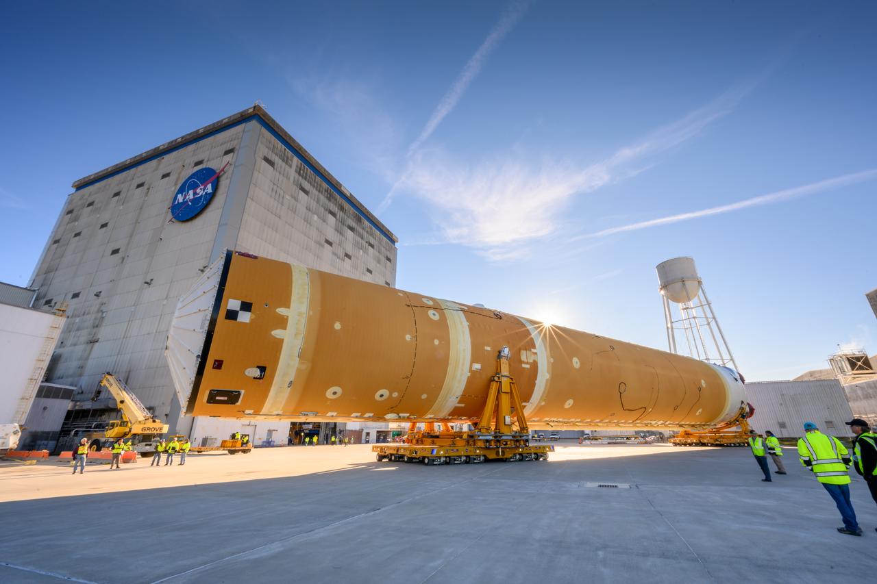 These images show the first core stage for NASA’s Space Launch System rocket inside NASA’s Pegasus barge on Jan. 8 ahead of its forthcoming journey to NASA’s Stennis Space Center near Bay St. Louis, Mississippi. Teams rolled out, or moved, the completed core stage from NASA’s Michoud Assembly Facility in New Orleans to the barge in preparation for the SLS rocket’s core stage Green Run test series at Stennis. Pegasus, which was modified to ferry SLS rocket hardware, will transport the core stage more than 40 miles from Michoud to Stennis for the comprehensive core stage Green Run test series. Green Run, named for its testing of new, or green, hardware progressively is the final test campaign ahead of the first Artemis launch.  Assembly and integration of the core stage and its four RS-25 engines has been a collaborative, multistep process for NASA and its partners Boeing, the core stage lead contractor, and Aerojet Rocketdyne, the RS-25 engines lead contractor. Together with four RS-25 engines, the rocket’s massive 212-foot-tall core stage — the largest stage NASA has ever built — and its twin solid rocket boosters will produce 8.8 million pounds of thrust to send NASA’s Orion spacecraft, astronauts and supplies beyond Earth’s orbit to the Moon and, ultimately, Mars. Offering more payload mass, volume capability and energy to speed missions through space, the SLS rocket, along with NASA’s Gateway in lunar orbit and Orion, is part of NASA’s backbone for deep space exploration and the Artemis lunar program. 