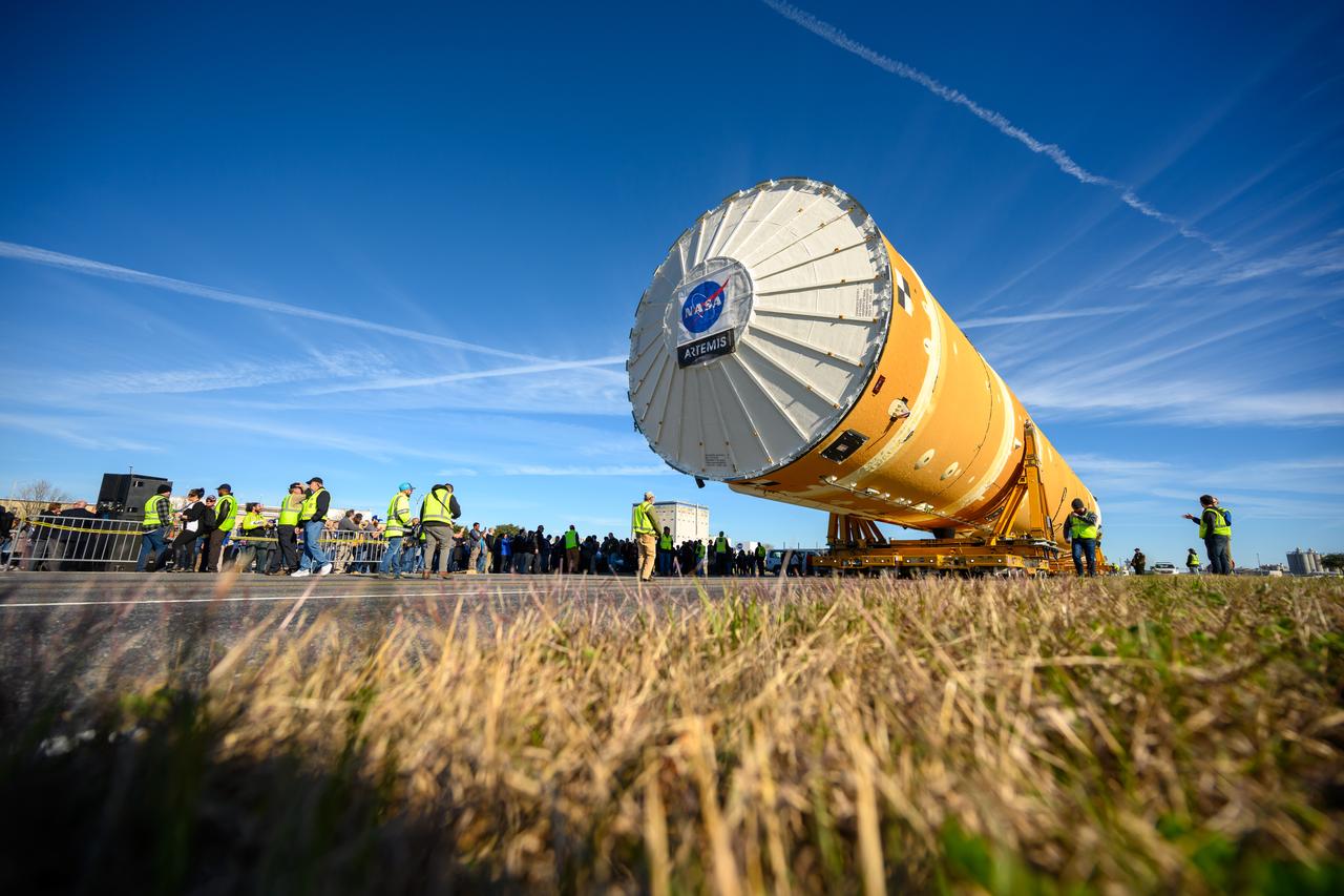 These images show the first core stage for NASA’s Space Launch System rocket inside NASA’s Pegasus barge on Jan. 8 ahead of its forthcoming journey to NASA’s Stennis Space Center near Bay St. Louis, Mississippi. Teams rolled out, or moved, the completed core stage from NASA’s Michoud Assembly Facility in New Orleans to the barge in preparation for the SLS rocket’s core stage Green Run test series at Stennis. Pegasus, which was modified to ferry SLS rocket hardware, will transport the core stage more than 40 miles from Michoud to Stennis for the comprehensive core stage Green Run test series. Green Run, named for its testing of new, or green, hardware progressively is the final test campaign ahead of the first Artemis launch.  Assembly and integration of the core stage and its four RS-25 engines has been a collaborative, multistep process for NASA and its partners Boeing, the core stage lead contractor, and Aerojet Rocketdyne, the RS-25 engines lead contractor. Together with four RS-25 engines, the rocket’s massive 212-foot-tall core stage — the largest stage NASA has ever built — and its twin solid rocket boosters will produce 8.8 million pounds of thrust to send NASA’s Orion spacecraft, astronauts and supplies beyond Earth’s orbit to the Moon and, ultimately, Mars. Offering more payload mass, volume capability and energy to speed missions through space, the SLS rocket, along with NASA’s Gateway in lunar orbit and Orion, is part of NASA’s backbone for deep space exploration and the Artemis lunar program. 