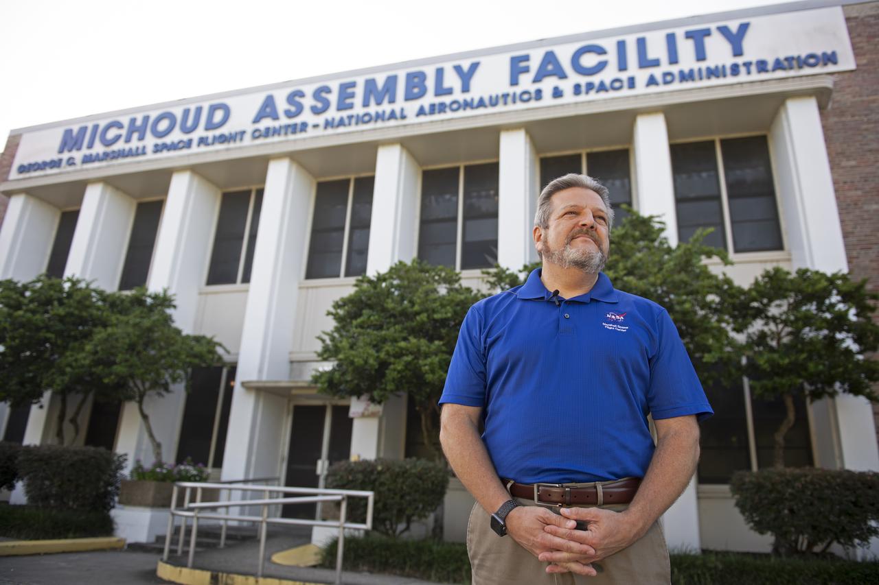 MAF Director Robert Champion stands in front of the Michoud Assembly Facility – America’s Rocket Factory.