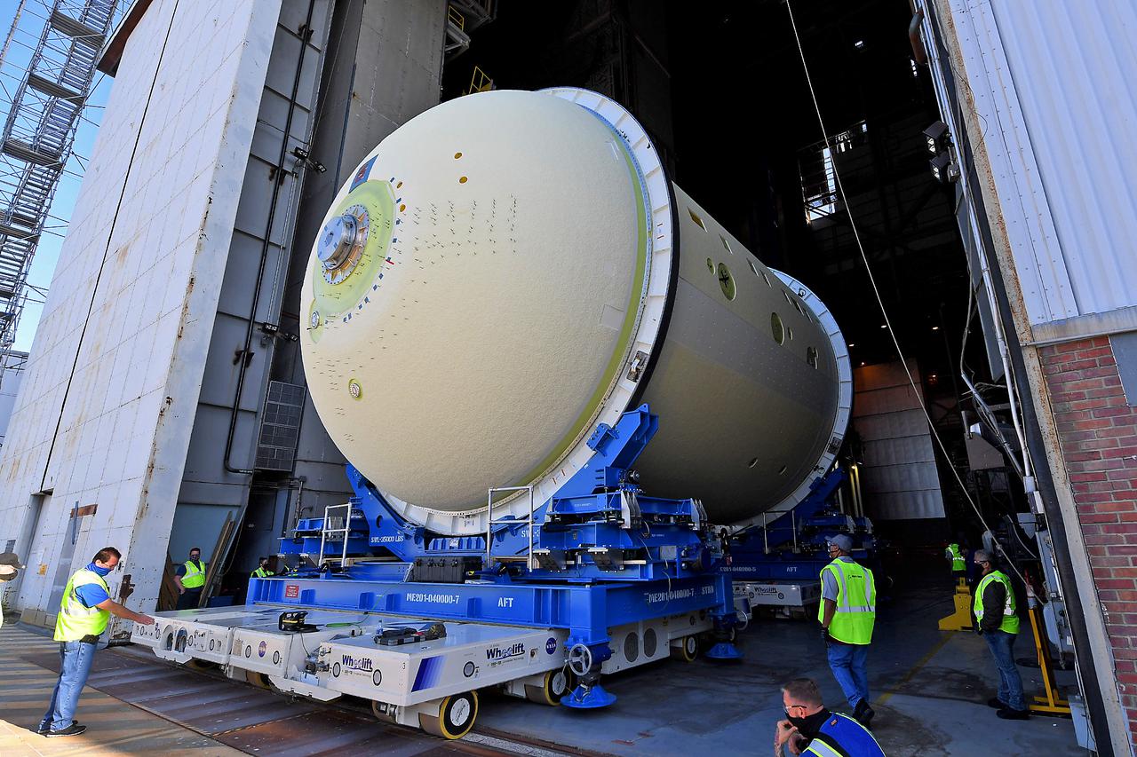 This image highlights the liquid oxygen tank, which will be used on the core stage of NASA’ Space Launch System rocket for Artemis II, the first crewed mission of NASA’s Artemis program, at NASA’s Michoud Assembly Facility. The SLS core stage is made up of five unique elements: the forward skirt, liquid oxygen tank, intertank, liquid hydrogen tank, and the engine section. The forward skirt houses flight computers, cameras, and avionics systems. The liquid oxygen tank holds 196,000 gallons of liquid oxygen cooled to minus 297 degrees Fahrenheit. The LOX hardware sits between the core stage’s forward skirt and the intertank. Along with the liquid hydrogen tank, it will provide fuel to the four RS-25 engines at the bottom of the core stage to produce more than two million pounds of thrust to launch NASA’s Artemis missions to the Moon.     Together with its four RS-25 engines, the rocket’s massive 212-foot-tall core stage — the largest stage NASA has ever built — and its twin solid rocket boosters will produce 8.8 million pounds of thrust to send NASA’s Orion spacecraft, astronauts and supplies beyond Earth’s orbit to the Moon and, ultimately, Mars. Offering more payload mass, volume capability and energy to speed missions through space, the SLS rocket, along with NASA’s Gateway in lunar orbit, the Human Landing System, and Orion spacecraft, is part of NASA’s backbone for deep space exploration and the Artemis lunar program. No other rocket can send astronauts in Orion around the Moon in a single mission.