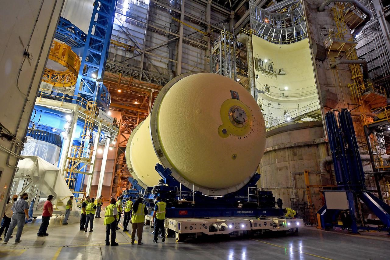 This image highlights the liquid oxygen tank, which will be used on the core stage of NASA’ Space Launch System rocket for Artemis II, the first crewed mission of NASA’s Artemis program, at NASA’s Michoud Assembly Facility. The SLS core stage is made up of five unique elements: the forward skirt, liquid oxygen tank, intertank, liquid hydrogen tank, and the engine section. The forward skirt houses flight computers, cameras, and avionics systems. The liquid oxygen tank holds 196,000 gallons of liquid oxygen cooled to minus 297 degrees Fahrenheit. The LOX hardware sits between the core stage’s forward skirt and the intertank. Along with the liquid hydrogen tank, it will provide fuel to the four RS-25 engines at the bottom of the core stage to produce more than two million pounds of thrust to launch NASA’s Artemis missions to the Moon.     Together with its four RS-25 engines, the rocket’s massive 212-foot-tall core stage — the largest stage NASA has ever built — and its twin solid rocket boosters will produce 8.8 million pounds of thrust to send NASA’s Orion spacecraft, astronauts and supplies beyond Earth’s orbit to the Moon and, ultimately, Mars. Offering more payload mass, volume capability and energy to speed missions through space, the SLS rocket, along with NASA’s Gateway in lunar orbit, the Human Landing System, and Orion spacecraft, is part of NASA’s backbone for deep space exploration and the Artemis lunar program. No other rocket can send astronauts in Orion around the Moon in a single mission.