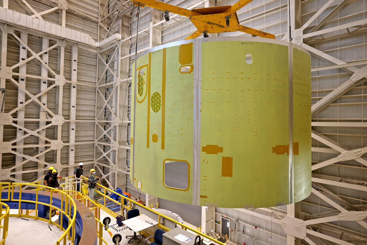Technicians at NASA’s Michoud Assembly Facility move the engine section of NASA’s Space Launch System rocket for Artemis III in preparation for its next step in production. This hardware is the first large piece manufactured for the Artemis III mission and makes up the lowest portion of the 212-foot-tall core stage. When complete, the engine section will house the four RS-25 engines and include vital systems for mounting, controlling and delivering fuel from the propellant tanks to the rocket’s engines.   Together with its four RS-25 engines and its twin solid rocket boosters, it will produce 8.8 million pounds of thrust to send NASA’s Orion spacecraft, astronauts, and supplies beyond Earth’s orbit to the Moon and, ultimately, Mars. Offering more payload mass, volume capability, and energy to speed missions through space, the SLS rocket, along with NASA’s Gateway in lunar orbit, the Human Landing System, and Orion spacecraft, is part of NASA’s backbone for deep space exploration and the Artemis lunar program. No other rocket is capable of carrying astronauts in Orion around the Moon in a single mission.  