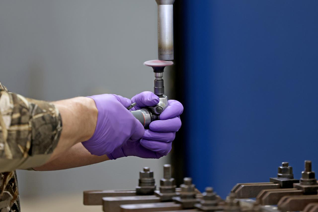 At NASA’s Michoud Assembly Facility in New Orleans, technicians from Orion prime contractor Lockheed Martin have welded together three cone-shaped panels on Orion’s crew module for the Artemis III mission that will land the first woman and next man on the Moon.  The crew module’s primary structure, the pressure vessel, is comprised of seven machined aluminum alloy pieces that are welded together through a weld process that produces a strong, air-tight habitable space for astronauts during the mission. The pressure vessel is designed to withstand the harsh and demanding environment of deep space, and is the core structure upon which all the other elements of Orion’s crew module are integrated.  Infographic showing the seven pieces of Orion's underlying structure  With welding complete on the crew module cone panels – one of which contains windows providing astronauts views of the Moon and Earth – work will begin joining the forward bulkhead to the tunnel to create the top of the spacecraft, followed by the barrel and aft bulkhead join to form the bottom of Orion.  Last, the forward bulkhead will be welded to the top of the panels and, for the seventh and closeout weld, the bottom of the cone panels will be joined to the barrel to complete the pressure vessel. Once welding of the Artemis III crew module primary structure is complete, it will be shipped to NASA’s Kennedy Space Center in Florida where it will undergo further assembly beginning this fall.  Orion, the Space Launch System, and Exploration Ground Systems programs are foundational elements of the Artemis program. Artemis I will be the first integrated flight test of Orion and SLS and is targeted to launch later this year. Artemis II will follow and is the first crewed mission, taking humans farther into space than ever before. Image credit: NASA/Michael DeMocker