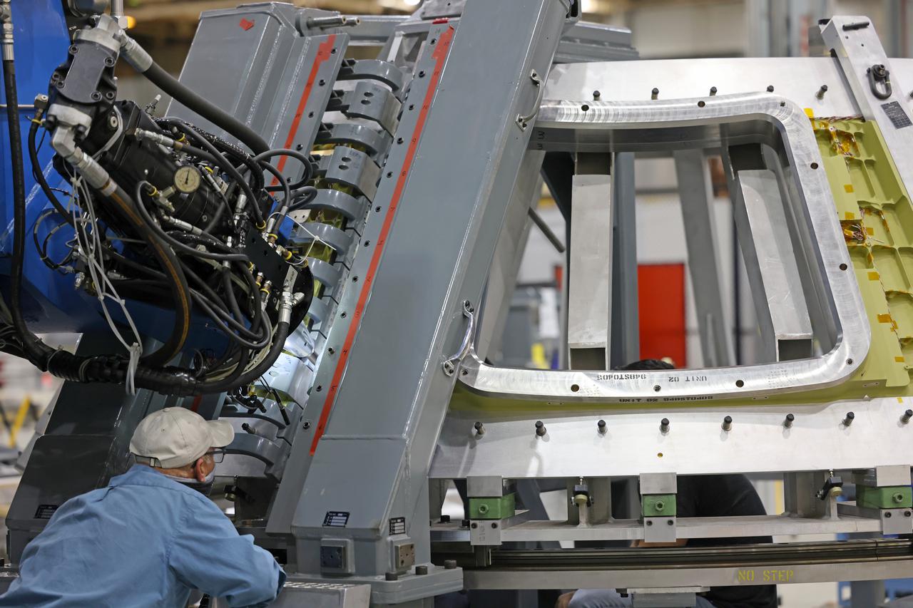 At NASA’s Michoud Assembly Facility in New Orleans, technicians from Orion prime contractor Lockheed Martin have welded together three cone-shaped panels on Orion’s crew module for the Artemis III mission that will land the first woman and next man on the Moon.  The crew module’s primary structure, the pressure vessel, is comprised of seven machined aluminum alloy pieces that are welded together through a weld process that produces a strong, air-tight habitable space for astronauts during the mission. The pressure vessel is designed to withstand the harsh and demanding environment of deep space, and is the core structure upon which all the other elements of Orion’s crew module are integrated.  Infographic showing the seven pieces of Orion's underlying structure  With welding complete on the crew module cone panels – one of which contains windows providing astronauts views of the Moon and Earth – work will begin joining the forward bulkhead to the tunnel to create the top of the spacecraft, followed by the barrel and aft bulkhead join to form the bottom of Orion.  Last, the forward bulkhead will be welded to the top of the panels and, for the seventh and closeout weld, the bottom of the cone panels will be joined to the barrel to complete the pressure vessel. Once welding of the Artemis III crew module primary structure is complete, it will be shipped to NASA’s Kennedy Space Center in Florida where it will undergo further assembly beginning this fall.  Orion, the Space Launch System, and Exploration Ground Systems programs are foundational elements of the Artemis program. Artemis I will be the first integrated flight test of Orion and SLS and is targeted to launch later this year. Artemis II will follow and is the first crewed mission, taking humans farther into space than ever before. Image credit: NASA/Michael DeMocker