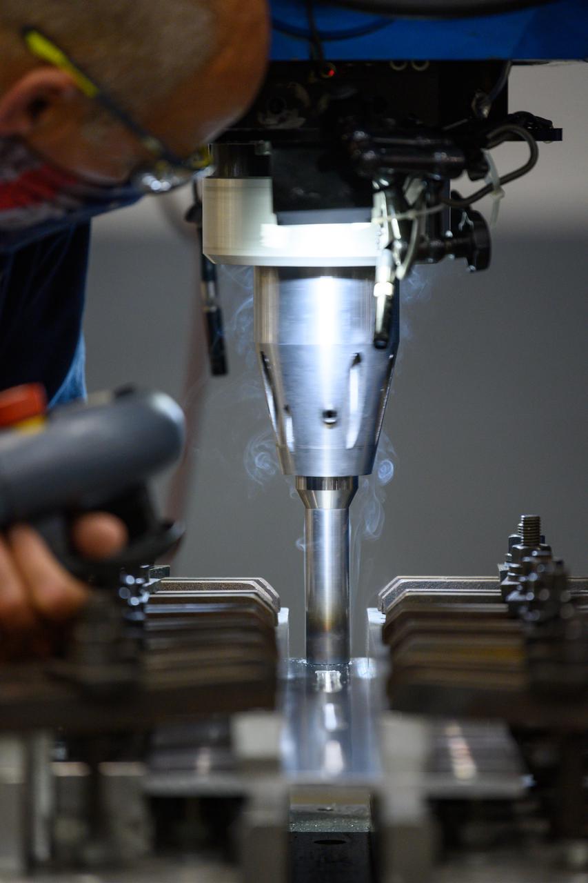 Technicians from Orion Prime Contractor Lockheed Martin weld the forward bulkhead of the pressure vessel to the tunnel hardware on the Orion Spacecraft for the Artemis III mission at NASA’s Michoud Assembly Facility in New Orleans. The crew module’s primary structure, the pressure vessel, is comprised of seven machined aluminum alloy pieces that are welded together through a weld process that produces a strong, air-tight habitable space for astronauts during the mission. The pressure vessel is designed to withstand the harsh and demanding environment of deep space and is the core structure upon which all the other elements of Orion’s crew module are integrated.  This pressure vessel weld is the next step following the completion of the crew module cone panel welds and creates the top of the spacecraft. Work will then begin to join the barrel with the aft bulkhead to form the bottom of Orion. Last, the forward bulkhead will be welded to the top of the panels and, for the seventh and closeout weld, the bottom of the cone panels will be joined to the barrel to complete the pressure vessel.  Once welding of the Artemis III crew module primary structure is complete, it will be shipped to NASA’s Kennedy Space Center in Florida where it will undergo further assembly beginning this fall. Orion, the Space Launch System, and Exploration Ground Systems programs are foundational elements of the Artemis program. Artemis I will be the first integrated flight test of Orion and SLS and is targeted to launch later this year. Artemis II will follow and is the first crewed mission, taking humans farther into space than ever before. 