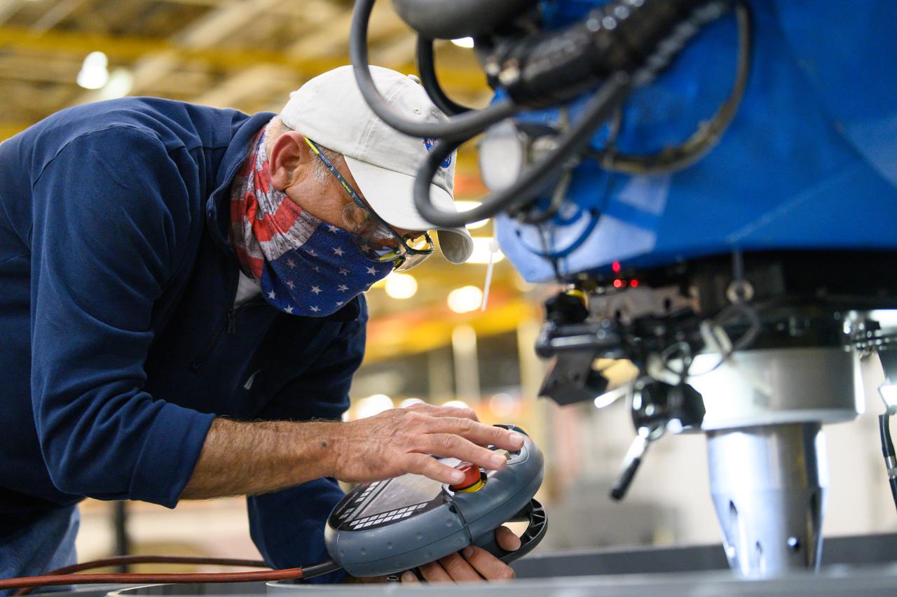 Technicians from Orion Prime Contractor Lockheed Martin weld the forward bulkhead of the pressure vessel to the tunnel hardware on the Orion Spacecraft for the Artemis III mission at NASA’s Michoud Assembly Facility in New Orleans. The crew module’s primary structure, the pressure vessel, is comprised of seven machined aluminum alloy pieces that are welded together through a weld process that produces a strong, air-tight habitable space for astronauts during the mission. The pressure vessel is designed to withstand the harsh and demanding environment of deep space and is the core structure upon which all the other elements of Orion’s crew module are integrated.  This pressure vessel weld is the next step following the completion of the crew module cone panel welds and creates the top of the spacecraft. Work will then begin to join the barrel with the aft bulkhead to form the bottom of Orion. Last, the forward bulkhead will be welded to the top of the panels and, for the seventh and closeout weld, the bottom of the cone panels will be joined to the barrel to complete the pressure vessel.  Once welding of the Artemis III crew module primary structure is complete, it will be shipped to NASA’s Kennedy Space Center in Florida where it will undergo further assembly beginning this fall. Orion, the Space Launch System, and Exploration Ground Systems programs are foundational elements of the Artemis program. Artemis I will be the first integrated flight test of Orion and SLS and is targeted to launch later this year. Artemis II will follow and is the first crewed mission, taking humans farther into space than ever before. 