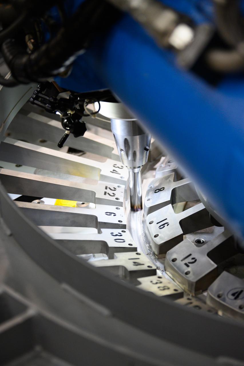 Technicians from Orion Prime Contractor Lockheed Martin weld the forward bulkhead of the pressure vessel to the tunnel hardware on the Orion Spacecraft for the Artemis III mission at NASA’s Michoud Assembly Facility in New Orleans. The crew module’s primary structure, the pressure vessel, is comprised of seven machined aluminum alloy pieces that are welded together through a weld process that produces a strong, air-tight habitable space for astronauts during the mission. The pressure vessel is designed to withstand the harsh and demanding environment of deep space and is the core structure upon which all the other elements of Orion’s crew module are integrated.  This pressure vessel weld is the next step following the completion of the crew module cone panel welds and creates the top of the spacecraft. Work will then begin to join the barrel with the aft bulkhead to form the bottom of Orion. Last, the forward bulkhead will be welded to the top of the panels and, for the seventh and closeout weld, the bottom of the cone panels will be joined to the barrel to complete the pressure vessel.  Once welding of the Artemis III crew module primary structure is complete, it will be shipped to NASA’s Kennedy Space Center in Florida where it will undergo further assembly beginning this fall. Orion, the Space Launch System, and Exploration Ground Systems programs are foundational elements of the Artemis program. Artemis I will be the first integrated flight test of Orion and SLS and is targeted to launch later this year. Artemis II will follow and is the first crewed mission, taking humans farther into space than ever before. 