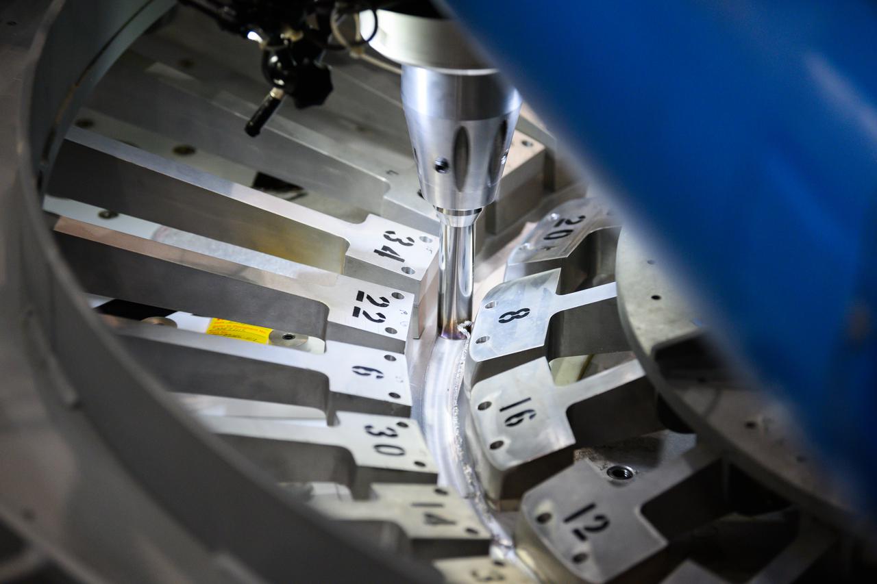 Technicians from Orion Prime Contractor Lockheed Martin weld the forward bulkhead of the pressure vessel to the tunnel hardware on the Orion Spacecraft for the Artemis III mission at NASA’s Michoud Assembly Facility in New Orleans. The crew module’s primary structure, the pressure vessel, is comprised of seven machined aluminum alloy pieces that are welded together through a weld process that produces a strong, air-tight habitable space for astronauts during the mission. The pressure vessel is designed to withstand the harsh and demanding environment of deep space and is the core structure upon which all the other elements of Orion’s crew module are integrated.  This pressure vessel weld is the next step following the completion of the crew module cone panel welds and creates the top of the spacecraft. Work will then begin to join the barrel with the aft bulkhead to form the bottom of Orion. Last, the forward bulkhead will be welded to the top of the panels and, for the seventh and closeout weld, the bottom of the cone panels will be joined to the barrel to complete the pressure vessel.  Once welding of the Artemis III crew module primary structure is complete, it will be shipped to NASA’s Kennedy Space Center in Florida where it will undergo further assembly beginning this fall. Orion, the Space Launch System, and Exploration Ground Systems programs are foundational elements of the Artemis program. Artemis I will be the first integrated flight test of Orion and SLS and is targeted to launch later this year. Artemis II will follow and is the first crewed mission, taking humans farther into space than ever before. 