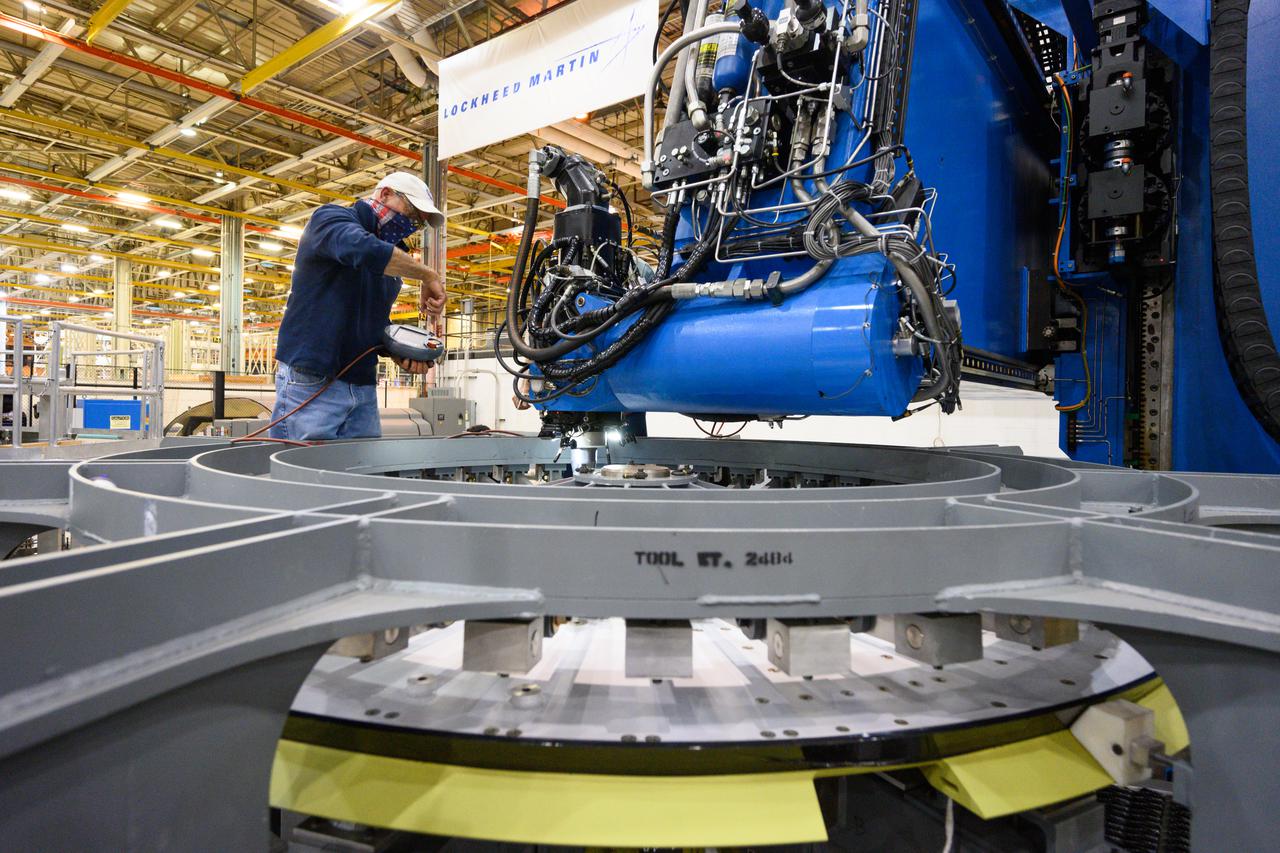 Technicians from Orion Prime Contractor Lockheed Martin weld the forward bulkhead of the pressure vessel to the tunnel hardware on the Orion Spacecraft for the Artemis III mission at NASA’s Michoud Assembly Facility in New Orleans. The crew module’s primary structure, the pressure vessel, is comprised of seven machined aluminum alloy pieces that are welded together through a weld process that produces a strong, air-tight habitable space for astronauts during the mission. The pressure vessel is designed to withstand the harsh and demanding environment of deep space and is the core structure upon which all the other elements of Orion’s crew module are integrated.  This pressure vessel weld is the next step following the completion of the crew module cone panel welds and creates the top of the spacecraft. Work will then begin to join the barrel with the aft bulkhead to form the bottom of Orion. Last, the forward bulkhead will be welded to the top of the panels and, for the seventh and closeout weld, the bottom of the cone panels will be joined to the barrel to complete the pressure vessel.  Once welding of the Artemis III crew module primary structure is complete, it will be shipped to NASA’s Kennedy Space Center in Florida where it will undergo further assembly beginning this fall. Orion, the Space Launch System, and Exploration Ground Systems programs are foundational elements of the Artemis program. Artemis I will be the first integrated flight test of Orion and SLS and is targeted to launch later this year. Artemis II will follow and is the first crewed mission, taking humans farther into space than ever before. 