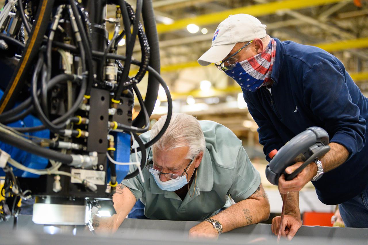 Technicians from Orion Prime Contractor Lockheed Martin weld the forward bulkhead of the pressure vessel to the tunnel hardware on the Orion Spacecraft for the Artemis III mission at NASA’s Michoud Assembly Facility in New Orleans. The crew module’s primary structure, the pressure vessel, is comprised of seven machined aluminum alloy pieces that are welded together through a weld process that produces a strong, air-tight habitable space for astronauts during the mission. The pressure vessel is designed to withstand the harsh and demanding environment of deep space and is the core structure upon which all the other elements of Orion’s crew module are integrated.  This pressure vessel weld is the next step following the completion of the crew module cone panel welds and creates the top of the spacecraft. Work will then begin to join the barrel with the aft bulkhead to form the bottom of Orion. Last, the forward bulkhead will be welded to the top of the panels and, for the seventh and closeout weld, the bottom of the cone panels will be joined to the barrel to complete the pressure vessel.  Once welding of the Artemis III crew module primary structure is complete, it will be shipped to NASA’s Kennedy Space Center in Florida where it will undergo further assembly beginning this fall. Orion, the Space Launch System, and Exploration Ground Systems programs are foundational elements of the Artemis program. Artemis I will be the first integrated flight test of Orion and SLS and is targeted to launch later this year. Artemis II will follow and is the first crewed mission, taking humans farther into space than ever before. 