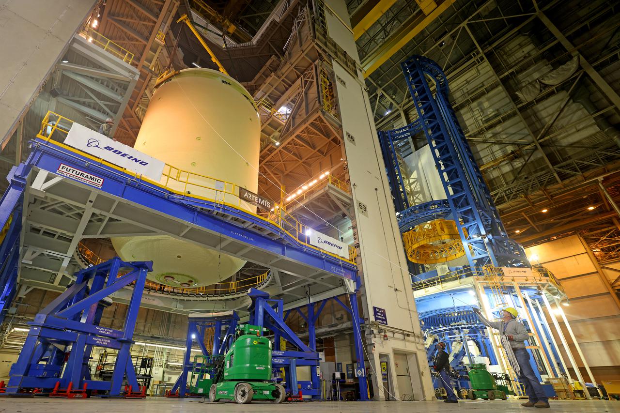 This image highlights the liquid oxygen tank, which will be used on the core stage of NASA’ Space Launch System rocket for Artemis II, the first crewed mission of NASA’s Artemis program, at NASA’s Michoud Assembly Facility. The SLS core stage is made up of five unique elements: the forward skirt, liquid oxygen tank, intertank, liquid hydrogen tank, and the engine section. The forward skirt houses flight computers, cameras, and avionics systems. The liquid oxygen tank holds 196,000 gallons of liquid oxygen cooled to minus 297 degrees Fahrenheit. The LOX hardware sits between the core stage’s forward skirt and the intertank. Along with the liquid hydrogen tank, it will provide fuel to the four RS-25 engines at the bottom of the core stage to produce more than two million pounds of thrust to launch NASA’s Artemis missions to the Moon.     Together with its four RS-25 engines, the rocket’s massive 212-foot-tall core stage — the largest stage NASA has ever built — and its twin solid rocket boosters will produce 8.8 million pounds of thrust to send NASA’s Orion spacecraft, astronauts and supplies beyond Earth’s orbit to the Moon and, ultimately, Mars. Offering more payload mass, volume capability and energy to speed missions through space, the SLS rocket, along with NASA’s Gateway in lunar orbit, the Human Landing System, and Orion spacecraft, is part of NASA’s backbone for deep space exploration and the Artemis lunar program. No other rocket can send astronauts in Orion around the Moon in a single mission. Image credit: NASA/Michael DeMocker 
