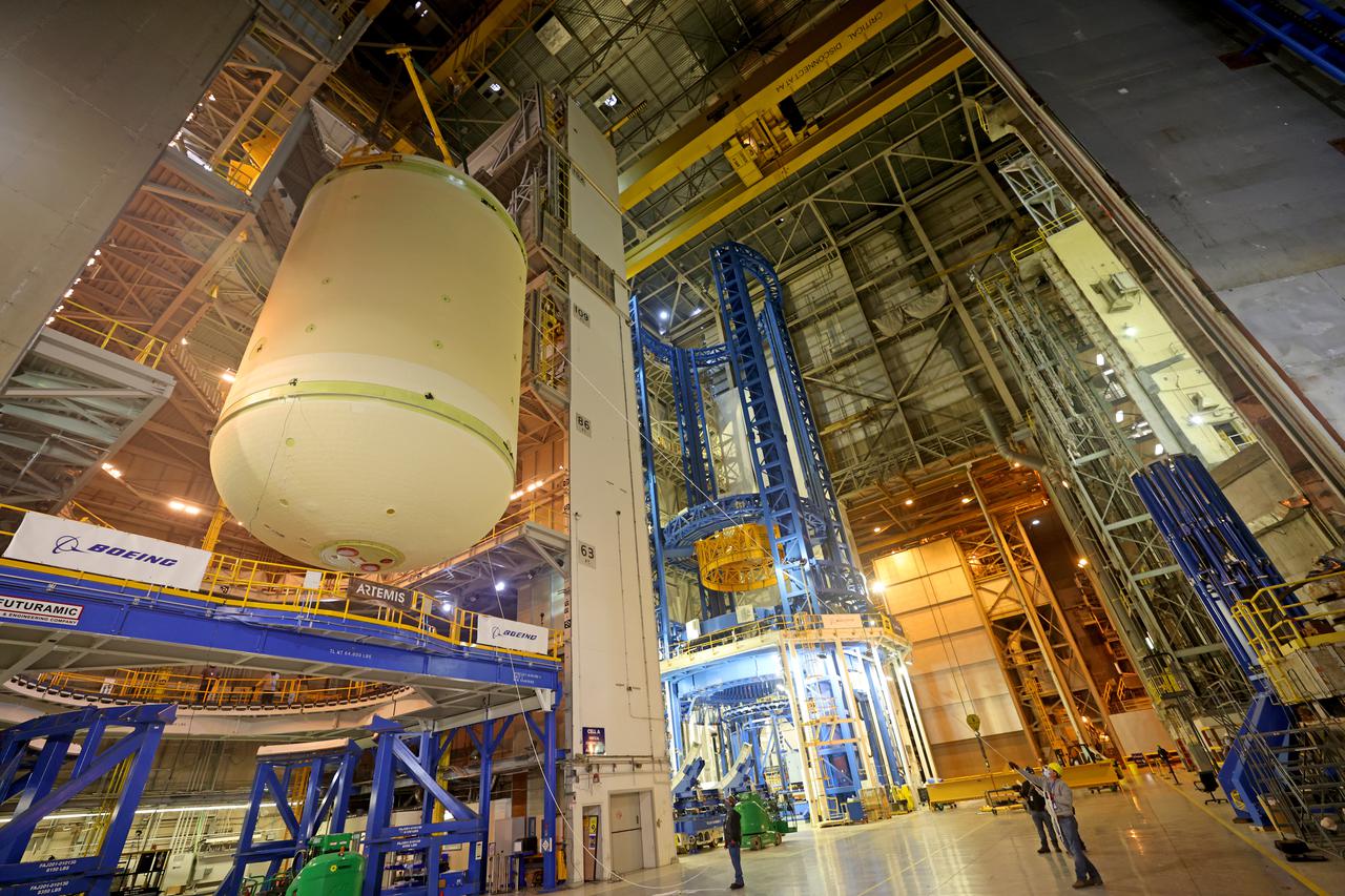 This image highlights the liquid oxygen tank, which will be used on the core stage of NASA’ Space Launch System rocket for Artemis II, the first crewed mission of NASA’s Artemis program, at NASA’s Michoud Assembly Facility. The SLS core stage is made up of five unique elements: the forward skirt, liquid oxygen tank, intertank, liquid hydrogen tank, and the engine section. The forward skirt houses flight computers, cameras, and avionics systems. The liquid oxygen tank holds 196,000 gallons of liquid oxygen cooled to minus 297 degrees Fahrenheit. The LOX hardware sits between the core stage’s forward skirt and the intertank. Along with the liquid hydrogen tank, it will provide fuel to the four RS-25 engines at the bottom of the core stage to produce more than two million pounds of thrust to launch NASA’s Artemis missions to the Moon.     Together with its four RS-25 engines, the rocket’s massive 212-foot-tall core stage — the largest stage NASA has ever built — and its twin solid rocket boosters will produce 8.8 million pounds of thrust to send NASA’s Orion spacecraft, astronauts and supplies beyond Earth’s orbit to the Moon and, ultimately, Mars. Offering more payload mass, volume capability and energy to speed missions through space, the SLS rocket, along with NASA’s Gateway in lunar orbit, the Human Landing System, and Orion spacecraft, is part of NASA’s backbone for deep space exploration and the Artemis lunar program. No other rocket can send astronauts in Orion around the Moon in a single mission. Image credit: NASA/Michael DeMocker 