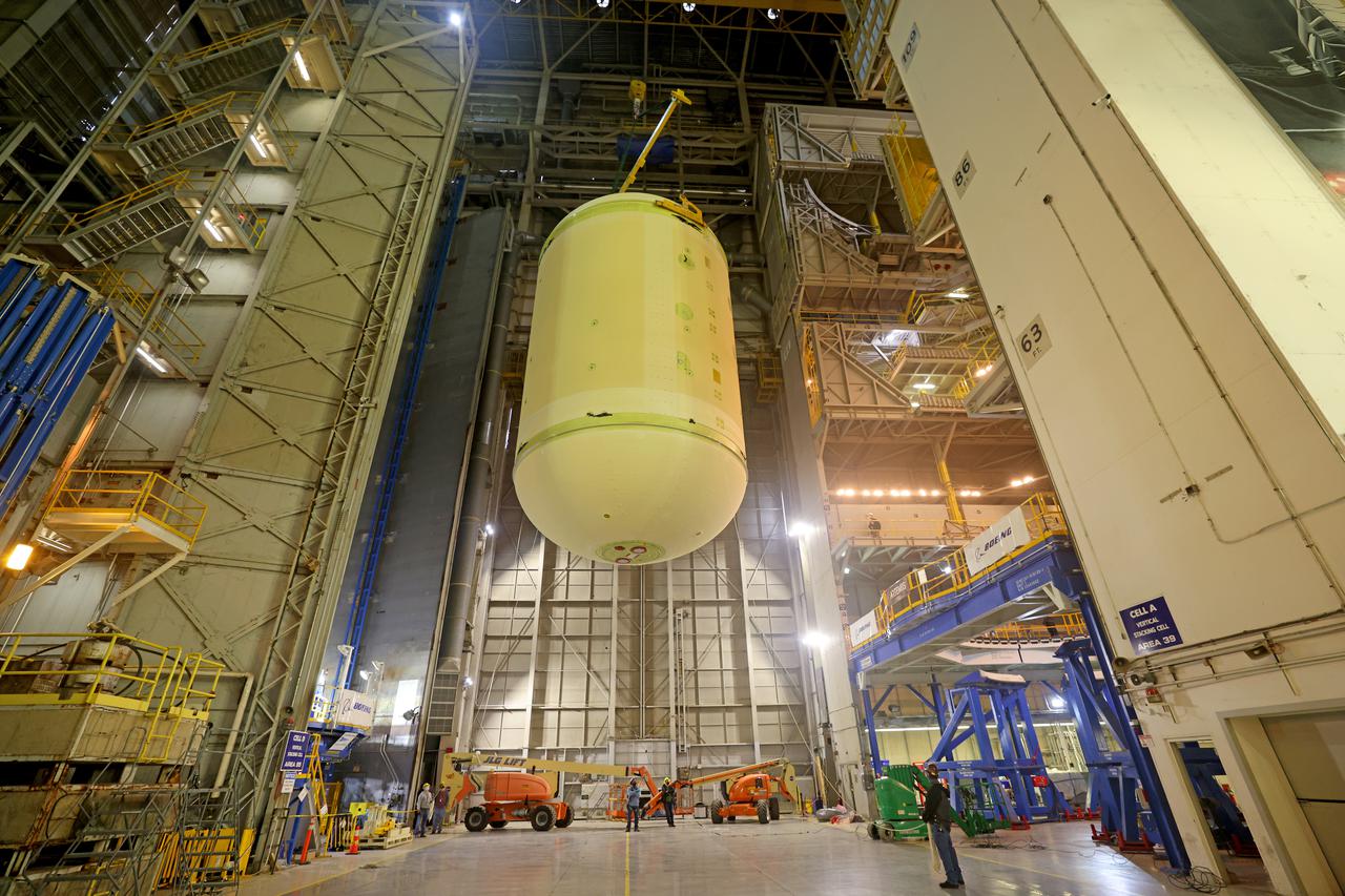 This image highlights the liquid oxygen tank, which will be used on the core stage of NASA’ Space Launch System rocket for Artemis II, the first crewed mission of NASA’s Artemis program, at NASA’s Michoud Assembly Facility. The SLS core stage is made up of five unique elements: the forward skirt, liquid oxygen tank, intertank, liquid hydrogen tank, and the engine section. The forward skirt houses flight computers, cameras, and avionics systems. The liquid oxygen tank holds 196,000 gallons of liquid oxygen cooled to minus 297 degrees Fahrenheit. The LOX hardware sits between the core stage’s forward skirt and the intertank. Along with the liquid hydrogen tank, it will provide fuel to the four RS-25 engines at the bottom of the core stage to produce more than two million pounds of thrust to launch NASA’s Artemis missions to the Moon.     Together with its four RS-25 engines, the rocket’s massive 212-foot-tall core stage — the largest stage NASA has ever built — and its twin solid rocket boosters will produce 8.8 million pounds of thrust to send NASA’s Orion spacecraft, astronauts and supplies beyond Earth’s orbit to the Moon and, ultimately, Mars. Offering more payload mass, volume capability and energy to speed missions through space, the SLS rocket, along with NASA’s Gateway in lunar orbit, the Human Landing System, and Orion spacecraft, is part of NASA’s backbone for deep space exploration and the Artemis lunar program. No other rocket can send astronauts in Orion around the Moon in a single mission. Image credit: NASA/Michael DeMocker 
