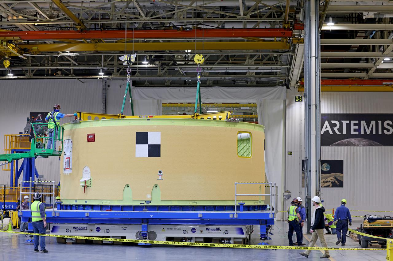 This image shows the forward skirt that will be used on the core stage of NASA’s Space Launch System rocket for Artemis II, the first crewed mission of NASA’s Artemis program, at NASA’s Michoud Assembly Facility. The SLS core stage is made up of five unique elements: the forward skirt, liquid oxygen tank, intertank, liquid hydrogen tank, and the engine section. The forward skirt houses flight computers, cameras, and avionics systems. The hardware is located at the top of the 212-foot-tall core stage and connects the upper part of the rocket to the core stage. Soon, technicians will ready the forward skirt for the first of three core stage assembly mates called the forward join. The forward join consists of three main parts -- the forward skirt, liquid oxygen tank, and intertank – to create the top, or forward part, of the core stage.  Together with its four RS-25 engines, the rocket’s massive 212-foot-tall core stage — the largest stage NASA has ever built — and its twin solid rocket boosters will produce 8.8 million pounds of thrust to send NASA’s Orion spacecraft, astronauts and supplies beyond Earth’s orbit to the Moon and, ultimately, Mars. Offering more payload mass, volume capability and energy to speed missions through space, the SLS rocket, along with NASA’s Gateway in lunar orbit, the human landing system, and Orion spacecraft, is part of NASA’s backbone for deep space exploration and the Artemis lunar program. No other rocket is capable of carrying astronauts in Orion around the Moon in a single mission. Image credit: NASA/Michael DeMocker 