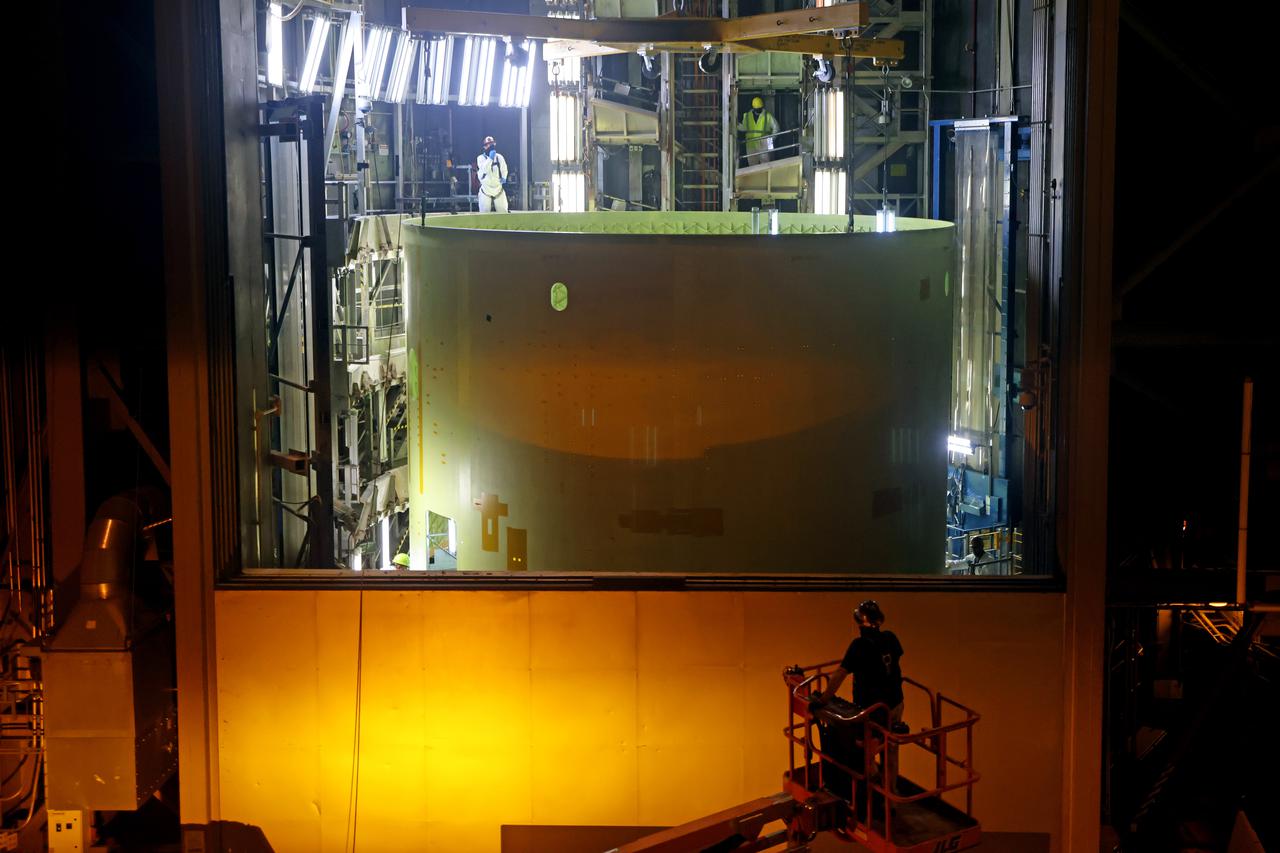 Technicians at NASA’s Michoud Assembly Facility prime and move the engine section of NASA’s Space Launch System rocket for Artemis III in preparation for its next step in production. This hardware is the first large piece manufactured for the Artemis III mission and makes up the lowest portion of the 212-foot-tall core stage. When complete, the engine section will house the four RS-25 engines and include vital systems for mounting, controlling and delivering fuel from the propellant tanks to the rocket’s engines.   Together with its four RS-25 engines and its twin solid rocket boosters, it will produce 8.8 million pounds of thrust to send NASA’s Orion spacecraft, astronauts, and supplies beyond Earth’s orbit to the Moon and, ultimately, Mars. Offering more payload mass, volume capability, and energy to speed missions through space, the SLS rocket, along with NASA’s Gateway in lunar orbit, the Human Landing System, and Orion spacecraft, is part of NASA’s backbone for deep space exploration and the Artemis lunar program. No other rocket is capable of carrying astronauts in Orion around the Moon in a single mission. 