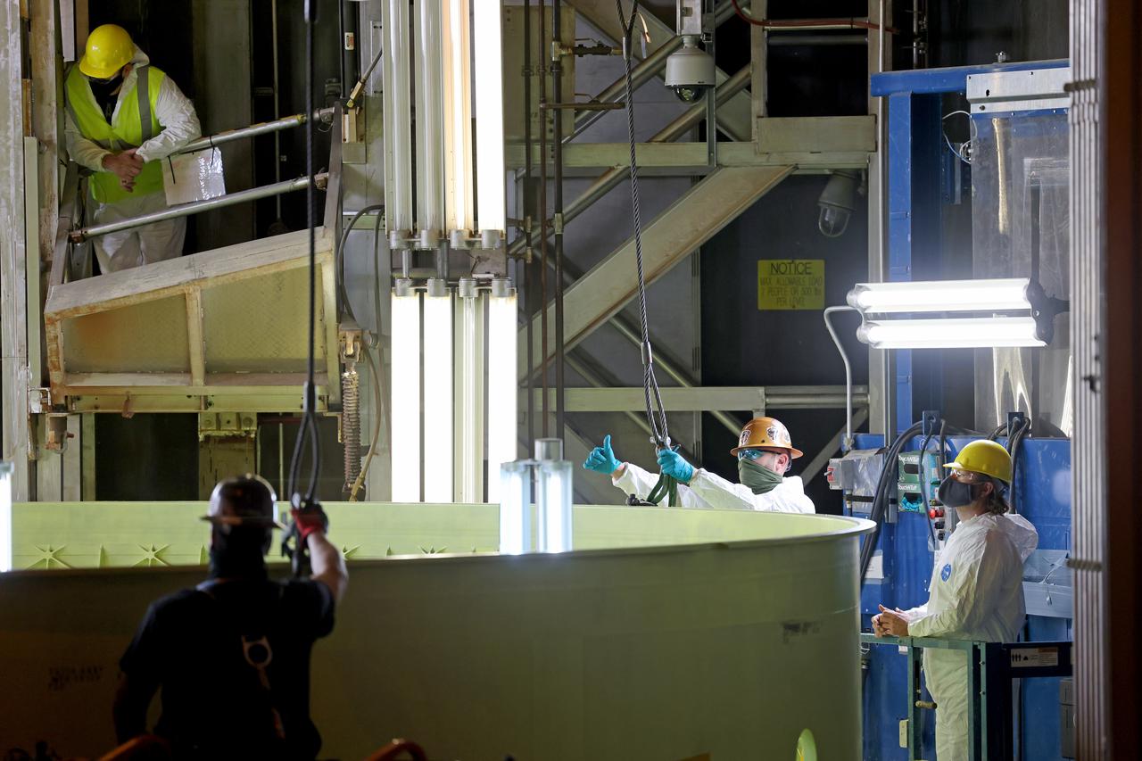 Technicians at NASA’s Michoud Assembly Facility prime and move the engine section of NASA’s Space Launch System rocket for Artemis III in preparation for its next step in production. This hardware is the first large piece manufactured for the Artemis III mission and makes up the lowest portion of the 212-foot-tall core stage. When complete, the engine section will house the four RS-25 engines and include vital systems for mounting, controlling and delivering fuel from the propellant tanks to the rocket’s engines.   Together with its four RS-25 engines and its twin solid rocket boosters, it will produce 8.8 million pounds of thrust to send NASA’s Orion spacecraft, astronauts, and supplies beyond Earth’s orbit to the Moon and, ultimately, Mars. Offering more payload mass, volume capability, and energy to speed missions through space, the SLS rocket, along with NASA’s Gateway in lunar orbit, the Human Landing System, and Orion spacecraft, is part of NASA’s backbone for deep space exploration and the Artemis lunar program. No other rocket is capable of carrying astronauts in Orion around the Moon in a single mission. 
