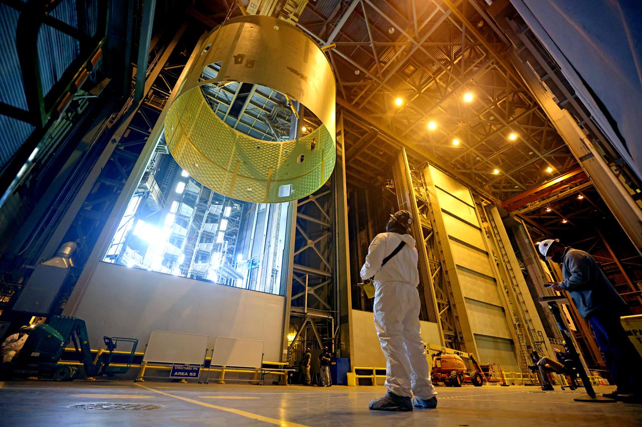 Technicians at NASA’s Michoud Assembly Facility prime and move the engine section of NASA’s Space Launch System rocket for Artemis III in preparation for its next step in production. This hardware is the first large piece manufactured for the Artemis III mission and makes up the lowest portion of the 212-foot-tall core stage. When complete, the engine section will house the four RS-25 engines and include vital systems for mounting, controlling and delivering fuel from the propellant tanks to the rocket’s engines.   Together with its four RS-25 engines and its twin solid rocket boosters, it will produce 8.8 million pounds of thrust to send NASA’s Orion spacecraft, astronauts, and supplies beyond Earth’s orbit to the Moon and, ultimately, Mars. Offering more payload mass, volume capability, and energy to speed missions through space, the SLS rocket, along with NASA’s Gateway in lunar orbit, the Human Landing System, and Orion spacecraft, is part of NASA’s backbone for deep space exploration and the Artemis lunar program. No other rocket is capable of carrying astronauts in Orion around the Moon in a single mission. 