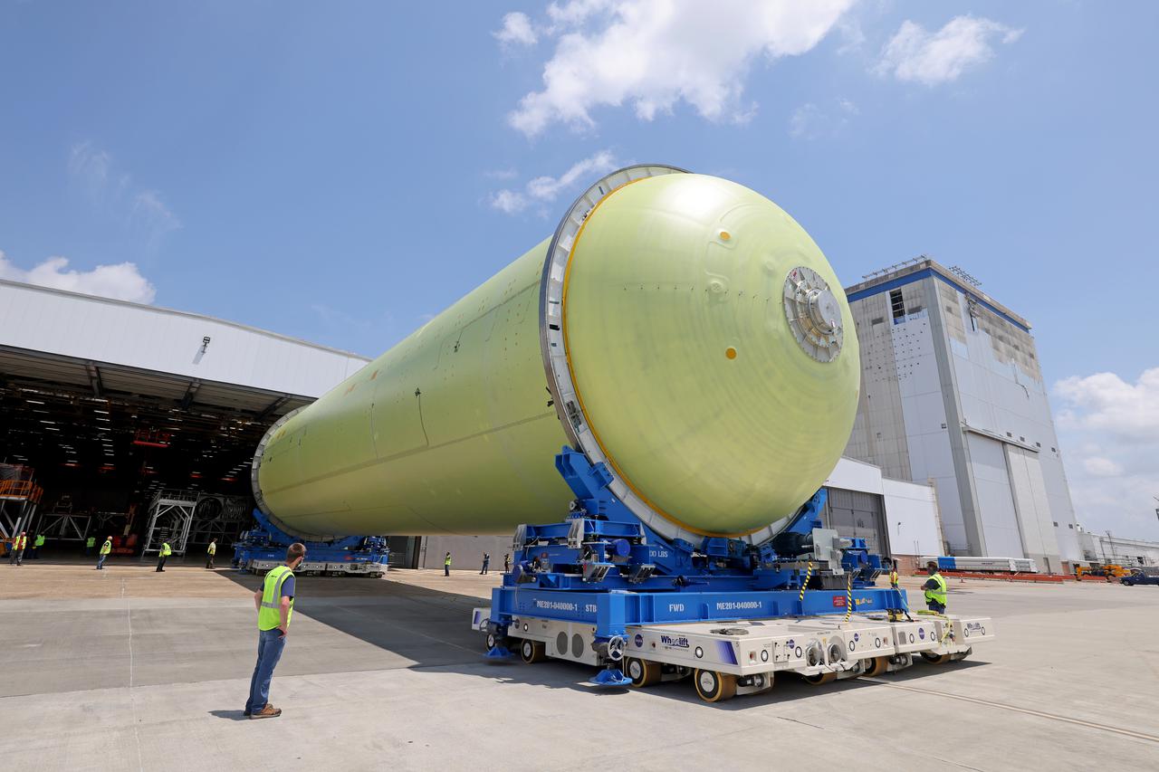 This image highlights the liquid hydrogen tank that will be used on the core stage of NASA’s Space Launch System rocket for Artemis II, the first crewed mission of NASA’s Artemis program. The tank is being built at NASA’s Michoud Assembly Facility in New Orleans. The SLS core stage is made up of five unique elements: the forward skirt, liquid oxygen tank, intertank, liquid hydrogen tank, and the engine section. The liquid hydrogen tank holds 537,000 gallons of liquid hydrogen cooled to minus 423 degrees Fahrenheit and sits between the core stage’s intertank and engine section. The liquid hydrogen hardware, along with the liquid oxygen tank, will provide propellant to the four RS-25 engines at the bottom of the cores stage to produce more than two million pounds of thrust to launch NASA’s Artemis missions to the Moon. Together with its four RS-25 engines, the rocket’s massive 212-foot-tall core stage — the largest stage NASA has ever built — and its twin solid rocket boosters will produce 8.8 million pounds of thrust to send NASA’s Orion spacecraft, astronauts and supplies beyond Earth’s orbit to the Moon and, ultimately, Mars. Offering more payload mass, volume capability and energy to speed missions through space, the SLS rocket, along with NASA’s Gateway in lunar orbit, the human landing system, and Orion spacecraft, is part of NASA’s backbone for deep space exploration and the Artemis lunar program. No other rocket can send astronauts in Orion around the Moon in a single mission. Image credit: NASA/Michael DeMocker 