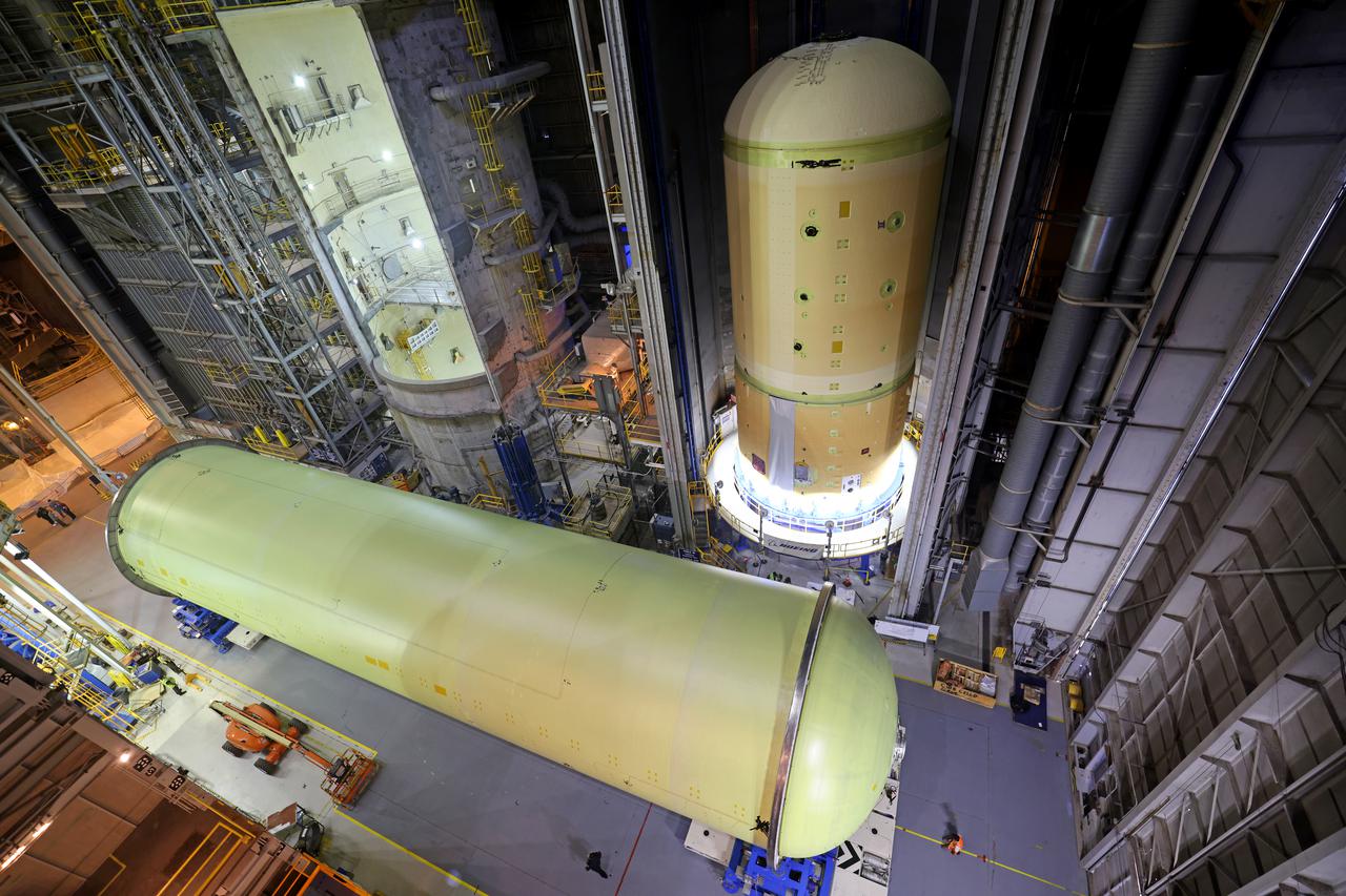 This image highlights the liquid hydrogen tank that will be used on the core stage of NASA’s Space Launch System rocket for Artemis II, the first crewed mission of NASA’s Artemis program. The tank is being built at NASA’s Michoud Assembly Facility in New Orleans. The SLS core stage is made up of five unique elements: the forward skirt, liquid oxygen tank, intertank, liquid hydrogen tank, and the engine section. The liquid hydrogen tank holds 537,000 gallons of liquid hydrogen cooled to minus 423 degrees Fahrenheit and sits between the core stage’s intertank and engine section. The liquid hydrogen hardware, along with the liquid oxygen tank, will provide propellant to the four RS-25 engines at the bottom of the cores stage to produce more than two million pounds of thrust to launch NASA’s Artemis missions to the Moon. Together with its four RS-25 engines, the rocket’s massive 212-foot-tall core stage — the largest stage NASA has ever built — and its twin solid rocket boosters will produce 8.8 million pounds of thrust to send NASA’s Orion spacecraft, astronauts and supplies beyond Earth’s orbit to the Moon and, ultimately, Mars. Offering more payload mass, volume capability and energy to speed missions through space, the SLS rocket, along with NASA’s Gateway in lunar orbit, the human landing system, and Orion spacecraft, is part of NASA’s backbone for deep space exploration and the Artemis lunar program. No other rocket can send astronauts in Orion around the Moon in a single mission. Image credit: NASA/Michael DeMocker