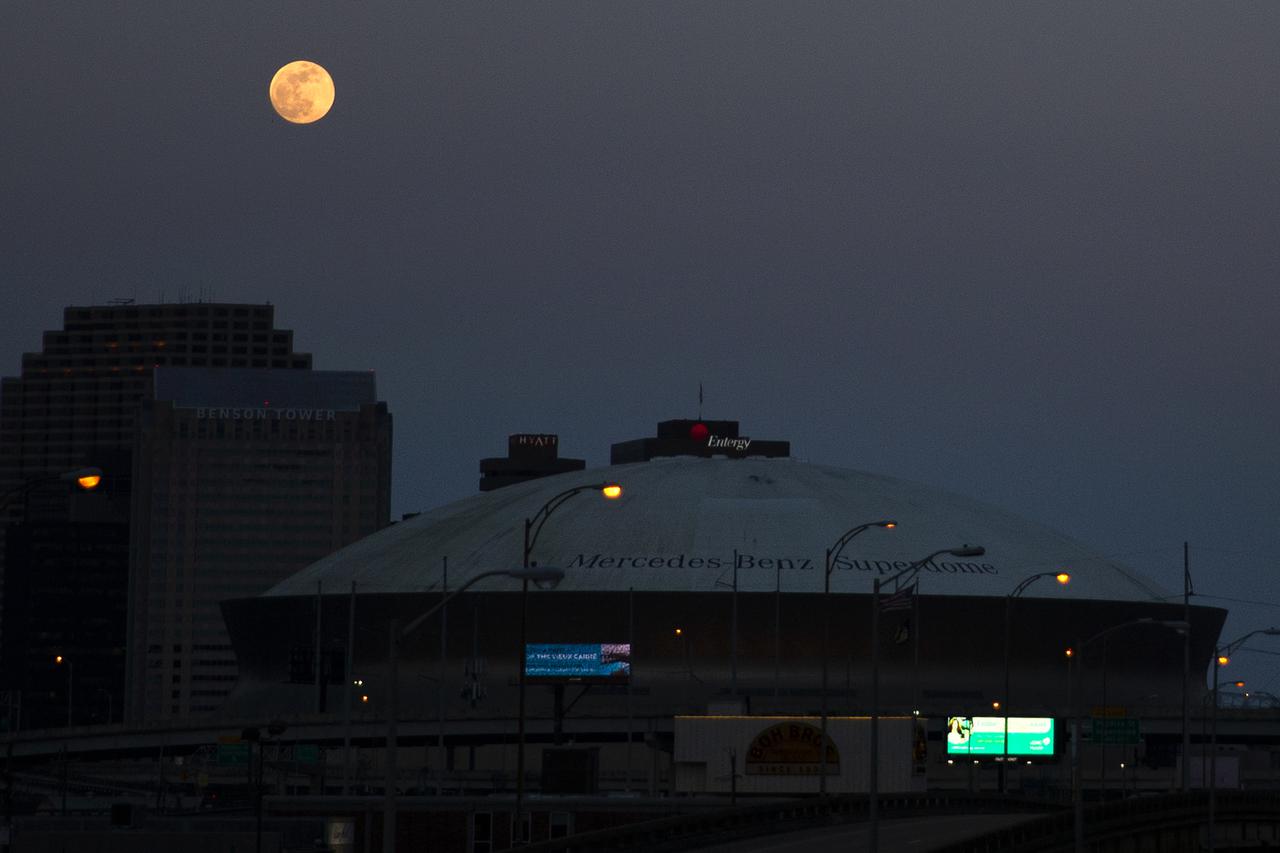 The nearly full moon rises over the Superdome and the city of New Orleans on Tuesday evening, May 25, 2021. Image credit: NASA/Michael DeMocker 