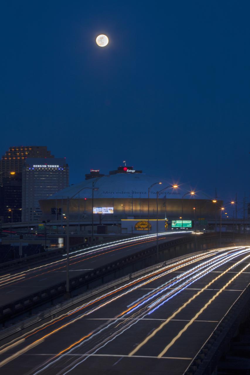 The nearly full moon rises over the city of New Orleans on Tuesday evening, May 25, 2021. Image credit: NASA/Michael DeMocker 