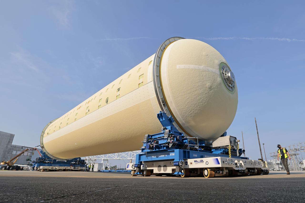 This image highlights the liquid hydrogen tank that will be used on the core stage of NASA’s Space Launch System rocket for Artemis II, the first crewed mission of NASA’s Artemis program. The tank is being built at NASA’s Michoud Assembly Facility in New Orleans. The SLS core stage is made up of five unique elements: the forward skirt, liquid oxygen tank, intertank, liquid hydrogen tank, and the engine section. The liquid hydrogen tank holds 537,000 gallons of liquid hydrogen cooled to minus 423 degrees Fahrenheit and sits between the core stage’s intertank and engine section. The liquid hydrogen hardware, along with the liquid oxygen tank, will provide propellant to the four RS-25 engines at the bottom of the cores stage to produce more than two million pounds of thrust to launch NASA’s Artemis missions to the Moon. Together with its four RS-25 engines, the rocket’s massive 212-foot-tall core stage — the largest stage NASA has ever built — and its twin solid rocket boosters will produce 8.8 million pounds of thrust to send NASA’s Orion spacecraft, astronauts and supplies beyond Earth’s orbit to the Moon and, ultimately, Mars. Offering more payload mass, volume capability and energy to speed missions through space, the SLS rocket, along with NASA’s Gateway in lunar orbit, the human landing system, and Orion spacecraft, is part of NASA’s backbone for deep space exploration and the Artemis lunar program. No other rocket can send astronauts in Orion around the Moon in a single mission. Image credit: NASA/Michael DeMocker