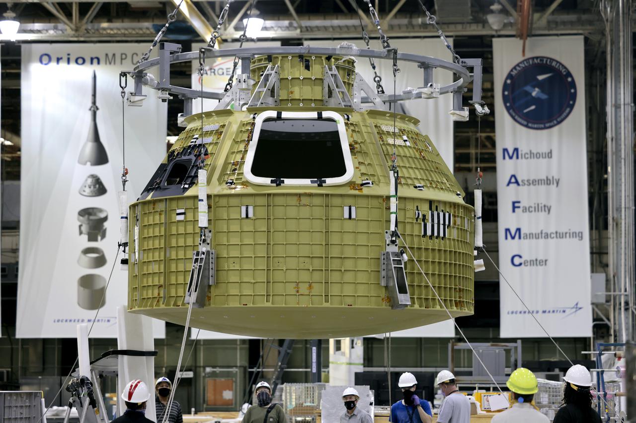Technician’s at NASA’s Michoud Assembly Facility in New Orleans prepared the newly-welded Artemis III mission Orion pressure vessel for shipment to NASA’s Kennedy Space Center’s in Florida, where it later arrived on October 15 at Kennedy’s Neil A. Armstrong Operations and Checkout Building. The pressure vessel, which was joined together using state-of-the-art welding by technicians from lead contractor Lockheed Martin, is the Orion crew module primary structure – the core upon which all other elements of Orion’s crew module are integrated. The structure is a critical element for crew as it holds the pressurized atmosphere astronauts breathe and work in while in the vacuum of deep space. Once transported to Kennedy’s Vehicle Assembly Building high bay, teams will begin integration of the pressure vessel with the Orion spacecraft crew module adapter and other assembly. Photographed on Wednesday, October 13, 2021. Image credit: NASA/Michael DeMocker 