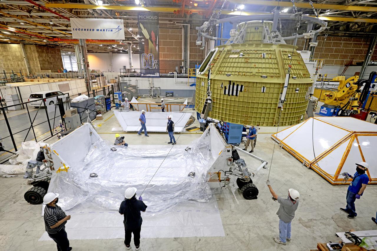 Technician’s at NASA’s Michoud Assembly Facility in New Orleans prepared the newly-welded Artemis III mission Orion pressure vessel for shipment to NASA’s Kennedy Space Center’s in Florida, where it later arrived on October 15 at Kennedy’s Neil A. Armstrong Operations and Checkout Building. The pressure vessel, which was joined together using state-of-the-art welding by technicians from lead contractor Lockheed Martin, is the Orion crew module primary structure – the core upon which all other elements of Orion’s crew module are integrated. The structure is a critical element for crew as it holds the pressurized atmosphere astronauts breathe and work in while in the vacuum of deep space. Once transported to Kennedy’s Vehicle Assembly Building high bay, teams will begin integration of the pressure vessel with the Orion spacecraft crew module adapter and other assembly. Photographed on Wednesday, October 13, 2021. Image credit: NASA/Michael DeMocker 