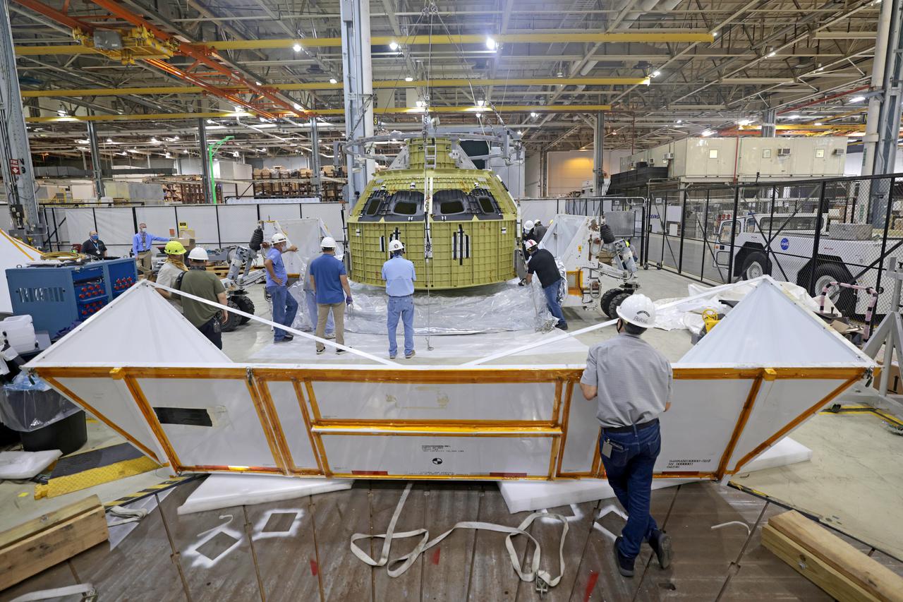 Technician’s at NASA’s Michoud Assembly Facility in New Orleans prepared the newly-welded Artemis III mission Orion pressure vessel for shipment to NASA’s Kennedy Space Center’s in Florida, where it later arrived on October 15 at Kennedy’s Neil A. Armstrong Operations and Checkout Building. The pressure vessel, which was joined together using state-of-the-art welding by technicians from lead contractor Lockheed Martin, is the Orion crew module primary structure – the core upon which all other elements of Orion’s crew module are integrated. The structure is a critical element for crew as it holds the pressurized atmosphere astronauts breathe and work in while in the vacuum of deep space. Once transported to Kennedy’s Vehicle Assembly Building high bay, teams will begin integration of the pressure vessel with the Orion spacecraft crew module adapter and other assembly. Photographed on Wednesday, October 13, 2021. Image credit: NASA/Michael DeMocker 