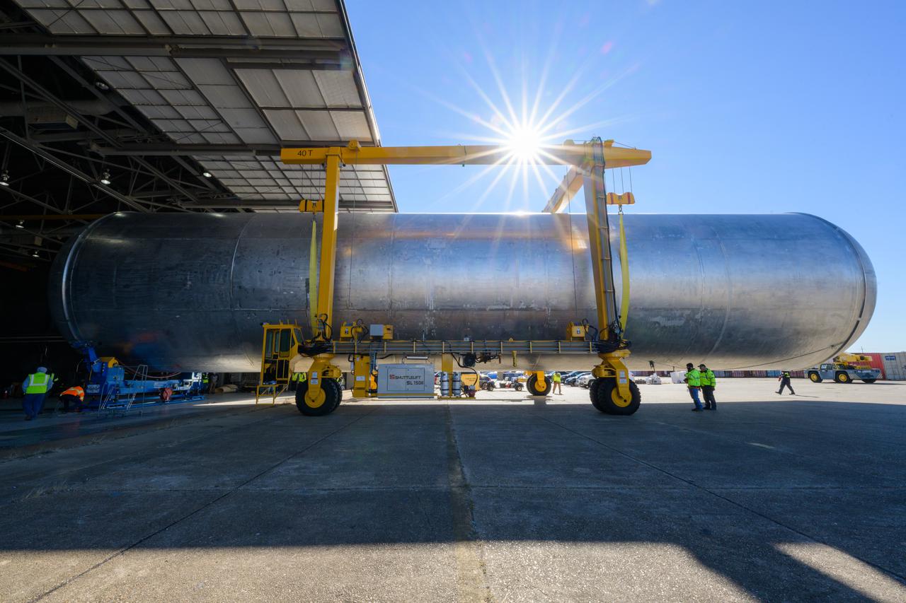 The liquid hydrogen tank that will be part of the Space Launch System rocket’s core stage is being prepared for the Artemis III mission at NASA’s Michoud Assembly Facility in New Orleans. Eventually, the tank will be connected to the engine section that will house the four RS-25 engines.  Once the aft simulator is attached, the LH2 tank undergoes non-destructive evaluation, which will test weld strength and ensure the tank is structurally sound.  The SLS core stage is made up of five unique elements: the forward skirt, liquid oxygen tank, intertank, liquid hydrogen tank, and the engine section. The tank holds 537,000 gallons of liquid hydrogen cooled to minus 432 degrees Fahrenheit and sits between the core stage’s intertank and engine section. The liquid hydrogen hardware, along with the liquid oxygen tank, will provide propellant to the four RS-25 engines at the bottom of the core stage to produce more than two million pounds of thrust to help launch the Artemis III mission to the Moon. Together with its four RS-25 engines, the rocket’s massive 212-foot-tall core stage — the largest stage NASA has ever built — and its twin solid rocket boosters will produce 8.8 million pounds of thrust to send NASA’s Orion spacecraft, astronauts and supplies beyond Earth’s orbit to the Moon.  