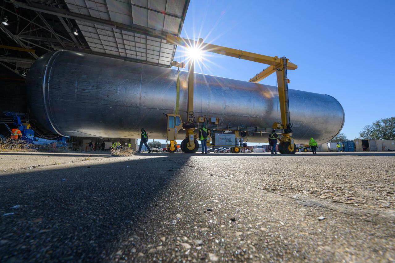 The liquid hydrogen tank that will be part of the Space Launch System rocket’s core stage is being prepared for the Artemis III mission at NASA’s Michoud Assembly Facility in New Orleans. Eventually, the tank will be connected to the engine section that will house the four RS-25 engines.  Once the aft simulator is attached, the LH2 tank undergoes non-destructive evaluation, which will test weld strength and ensure the tank is structurally sound.  The SLS core stage is made up of five unique elements: the forward skirt, liquid oxygen tank, intertank, liquid hydrogen tank, and the engine section. The tank holds 537,000 gallons of liquid hydrogen cooled to minus 432 degrees Fahrenheit and sits between the core stage’s intertank and engine section. The liquid hydrogen hardware, along with the liquid oxygen tank, will provide propellant to the four RS-25 engines at the bottom of the core stage to produce more than two million pounds of thrust to help launch the Artemis III mission to the Moon. Together with its four RS-25 engines, the rocket’s massive 212-foot-tall core stage — the largest stage NASA has ever built — and its twin solid rocket boosters will produce 8.8 million pounds of thrust to send NASA’s Orion spacecraft, astronauts and supplies beyond Earth’s orbit to the Moon.  