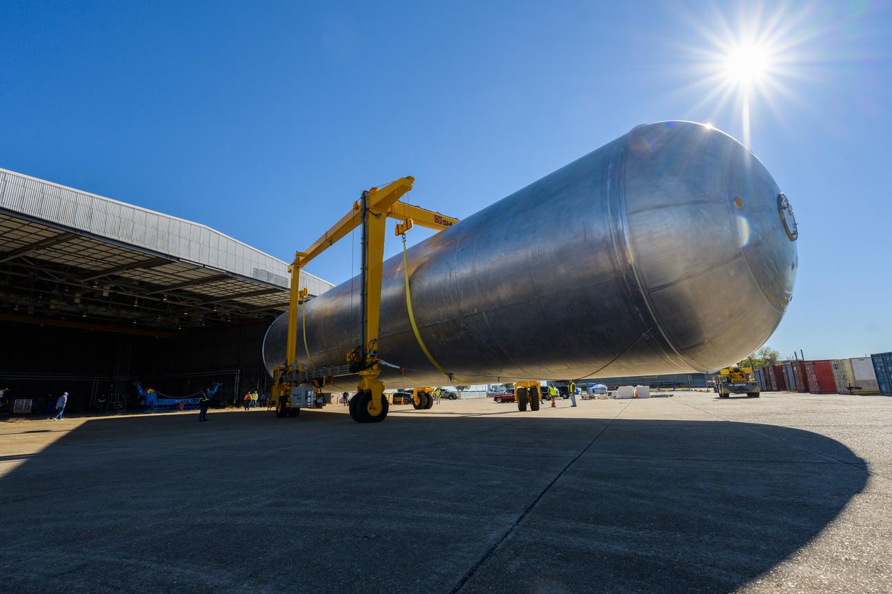 The liquid hydrogen tank that will be part of the Space Launch System rocket’s core stage is being prepared for the Artemis III mission at NASA’s Michoud Assembly Facility in New Orleans. Eventually, the tank will be connected to the engine section that will house the four RS-25 engines.  Once the aft simulator is attached, the LH2 tank undergoes non-destructive evaluation, which will test weld strength and ensure the tank is structurally sound.  The SLS core stage is made up of five unique elements: the forward skirt, liquid oxygen tank, intertank, liquid hydrogen tank, and the engine section. The tank holds 537,000 gallons of liquid hydrogen cooled to minus 432 degrees Fahrenheit and sits between the core stage’s intertank and engine section. The liquid hydrogen hardware, along with the liquid oxygen tank, will provide propellant to the four RS-25 engines at the bottom of the core stage to produce more than two million pounds of thrust to help launch the Artemis III mission to the Moon. Together with its four RS-25 engines, the rocket’s massive 212-foot-tall core stage — the largest stage NASA has ever built — and its twin solid rocket boosters will produce 8.8 million pounds of thrust to send NASA’s Orion spacecraft, astronauts and supplies beyond Earth’s orbit to the Moon.  