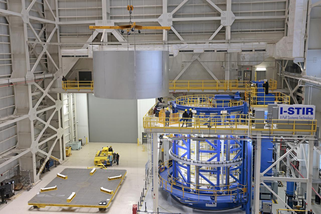 On Thursday, February 10, 2022, move crews at NASA’s Michoud Assembly Facility lift the core stage 3 liquid oxygen tank (LOX) aft barrel out of the vertical friction stir weld tool to be moved for its next phase of production. Eventually, the aft barrel will be mated with the forward barrel and forward and aft domes to create the LOX tank, which will be used for the Space Launch System’s Artemis III mission. The LOX tank holds 196,000 gallons of super-cooled liquid oxygen to help fuel four RS-25 engines. The SLS core stage is made up of five unique elements: the forward skirt, liquid oxygen tank, intertank, liquid hydrogen tank, and the engine section. The liquid oxygen hardware, along with the liquid hydrogen tank will provide propellant to the four RS-25 engines to produce more than two million pounds of thrust to help launch NASA’s Orion spacecraft, astronauts, and supplies beyond Earth’s orbit to the Moon. Image credit: NASA/Michael DeMocker