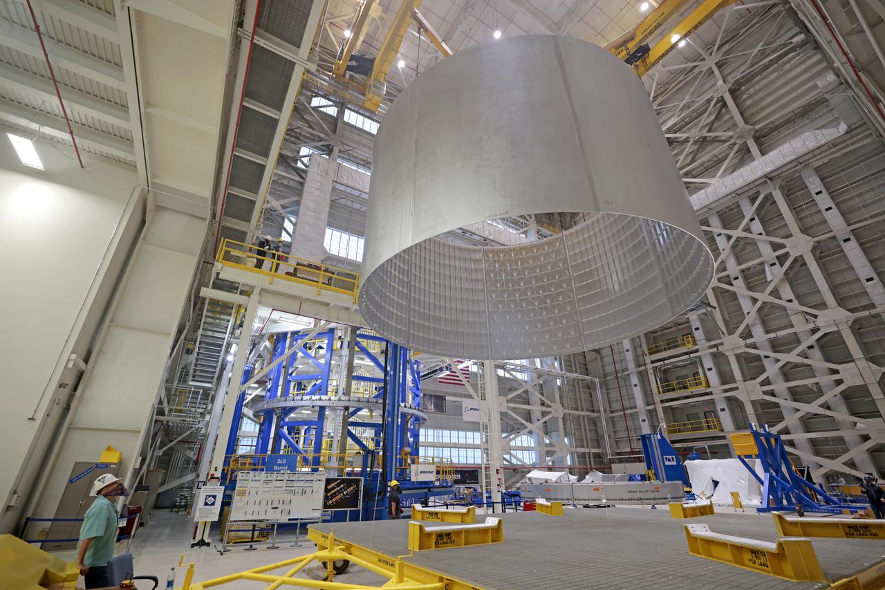 On Thursday, February 10, 2022, move crews at NASA’s Michoud Assembly Facility lift the core stage 3 liquid oxygen tank (LOX) aft barrel out of the vertical friction stir weld tool to be moved for its next phase of production. Eventually, the aft barrel will be mated with the forward barrel and forward and aft domes to create the LOX tank, which will be used for the Space Launch System’s Artemis III mission. The LOX tank holds 196,000 gallons of super-cooled liquid oxygen to help fuel four RS-25 engines. The SLS core stage is made up of five unique elements: the forward skirt, liquid oxygen tank, intertank, liquid hydrogen tank, and the engine section. The liquid oxygen hardware, along with the liquid hydrogen tank will provide propellant to the four RS-25 engines to produce more than two million pounds of thrust to help launch NASA’s Orion spacecraft, astronauts, and supplies beyond Earth’s orbit to the Moon. Image credit: NASA/Michael DeMocker