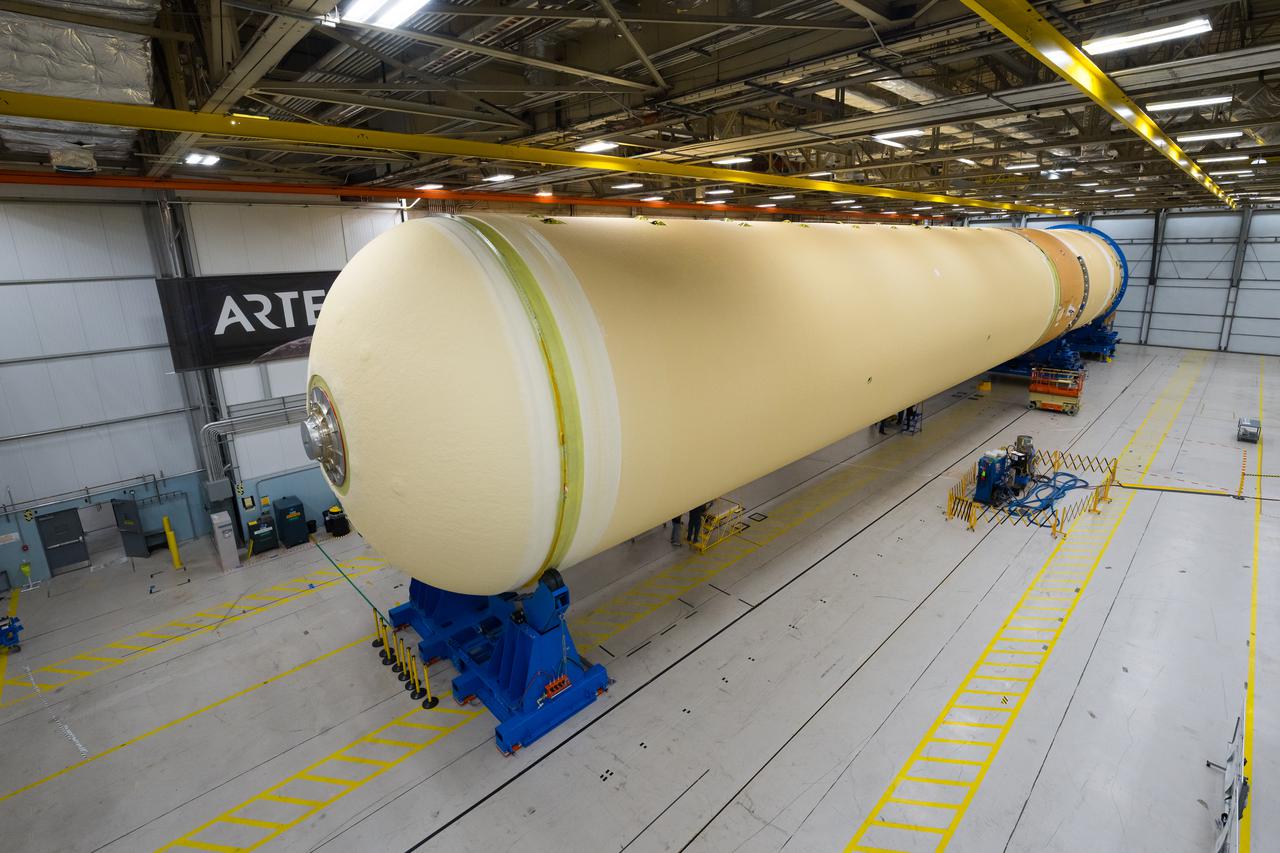NASA joined the Space Launch System rocket’s core stage forward assembly with the 130-foot liquid hydrogen tank for the Artemis II mission on March 18. This completes assembly of four of the five large structures that make up the core stage that will help send the first astronauts to lunar orbit on Artemis II. The 66-foot forward assembly consists of the forward skirt, liquid oxygen tank and the intertank, which were mated earlier. Engineers inserted 360 bolts to connect the forward assembly to the liquid hydrogen tank to make up the bulk of the stage. Only the engine section, which is currently being outfitted and includes the main propulsion systems that connect to the four RS-25 engines, remains to be added to form the final core stage. All parts of the core stage are manufactured by NASA and Boeing, the core stage lead contractor at the agency’s Michoud Assembly Facility in New Orleans. Currently, the team is building core stages for three Artemis missions. The first core stage is stacked with the rest of the SLS rocket, which will launch the Artemis I mission to the Moon this year. Together with its twin solid rocket boosters, the core stage will produce 8.8 million pounds of thrust to send NASA’s Orion spacecraft, astronauts, and supplies beyond Earth’s orbit to the Moon. The SLS rocket and the Orion spacecraft form the foundation for Artemis missions and future deep space exploration.