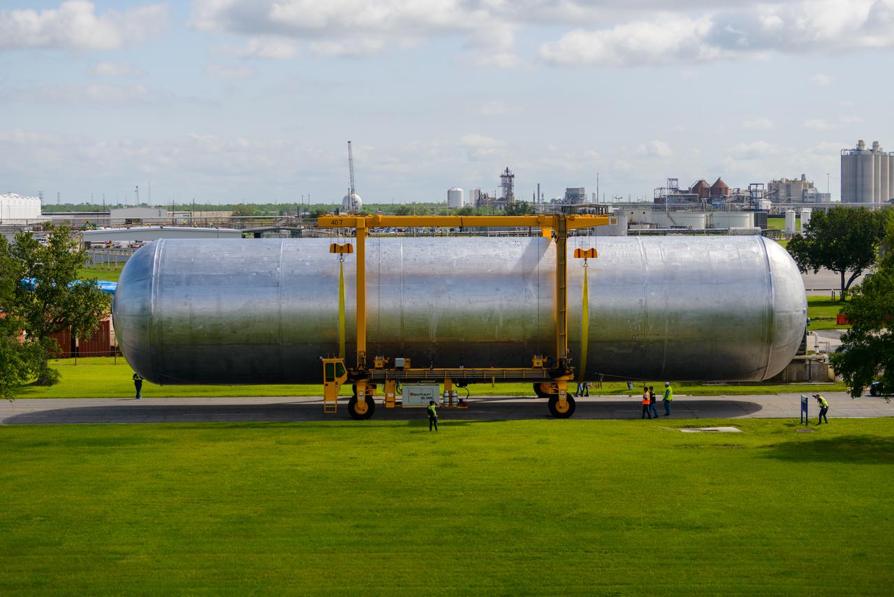 The core stage liquid hydrogen tank for the Artemis III mission completed proof testing, and technicians returned it to the main factory building at NASA’s Michoud Assembly Facility in New Orleans where it will undergo more outfitting. As part of proof testing, technicians apply a simple soap solution and check for leaks by observing any bubble formation on the welds. The technician removed the bubble solution with distilled water and then dried the area of application to prevent corrosion. To build the Space Launch System (SLS) rocket’s 130-foot core stage liquid hydrogen tank, engineers use robotic tools to weld five-barrel segments. This process results in a tank with around 1,900 feet, or more than six football fields, of welds that must be tested by hand. After the leak tests, the core stage lead, Boeing, pressurized the SLS tank to further ensure there were no leaks. After it passed proof testing, technicians moved the Artemis III liquid hydrogen tank to Michoud’s main factory. Soon, the technicians will prime and apply a foam-based thermal protection system that protects the tank during launch. Later, the tank will be joined with other parts of the core stage to form the entire 212-foot rocket stage with its four RS-25 engines that produce 2 million pounds of thrust to help launch the rocket. Artemis III will land the first astronauts on the lunar surface. Photographed on Monday, April 18, 2022. 