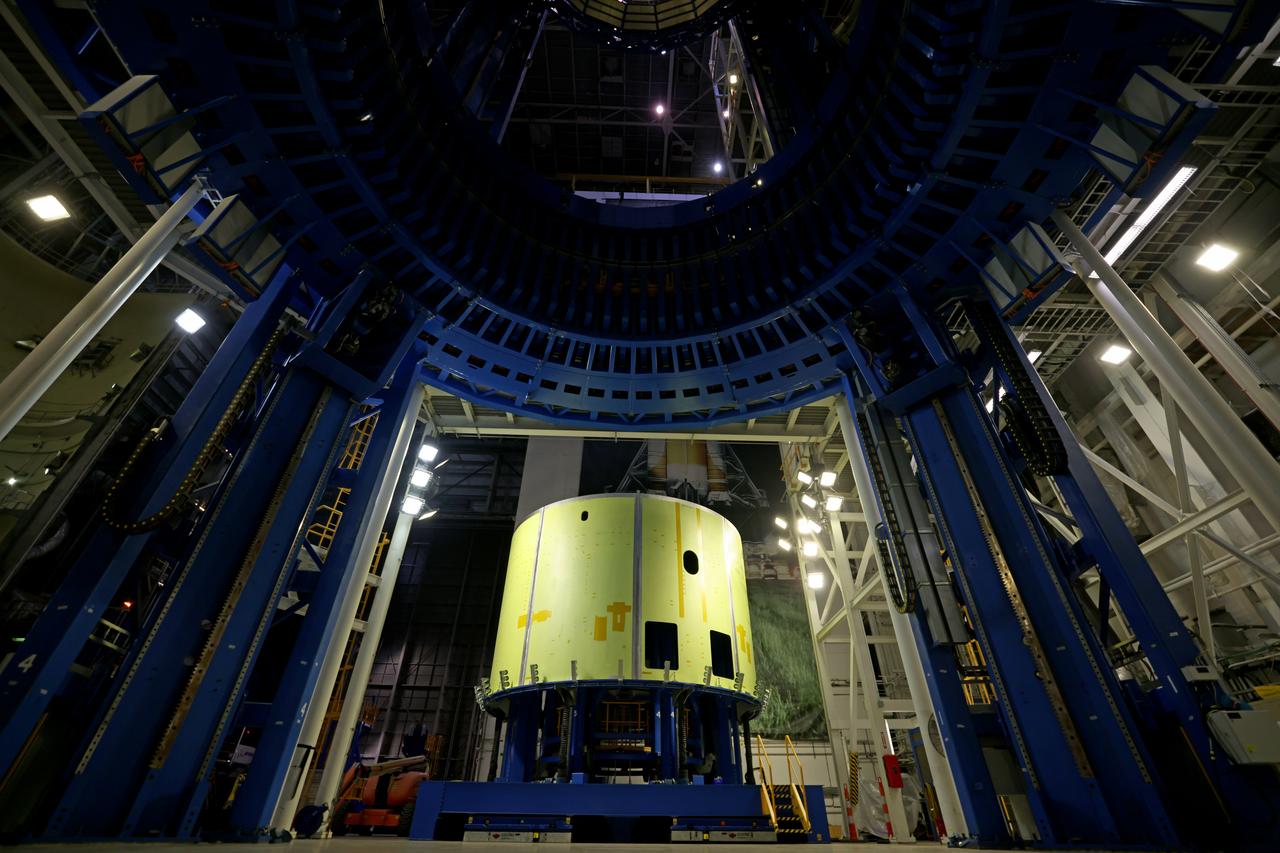 Technicians at NASA’s Michoud Assembly Facility prepare to move the engine section of NASA’s Space Launch System rocket for Artemis IV to the Vertical Assembly Building for the next step in production. This hardware is the first large piece manufactured for the Artemis IV mission and makes up the lowest portion of the 212-foot-tall core stage. When complete, the engine section will house the four RS-25 engines and include vital systems for mounting, controlling and delivering fuel from the propellant tanks to the rocket’s engines. Together with its four RS-25 engines and its twin solid rocket boosters, it will produce 8.8 million pounds of thrust to send NASA’s Orion spacecraft, astronauts, and supplies beyond Earth’s orbit to the Moon and, ultimately, Mars. Offering more payload mass, volume capability, and energy to speed missions through space, the SLS rocket, along with NASA’s Gateway in lunar orbit, the Human Landing System, and Orion spacecraft, is part of NASA’s backbone for deep space exploration and the Artemis lunar program. No other rocket is capable of carrying astronauts in Orion around the Moon in a single mission. Photographed on Thursday, May 12, 2022. Image credit: NASA/Michael DeMocker