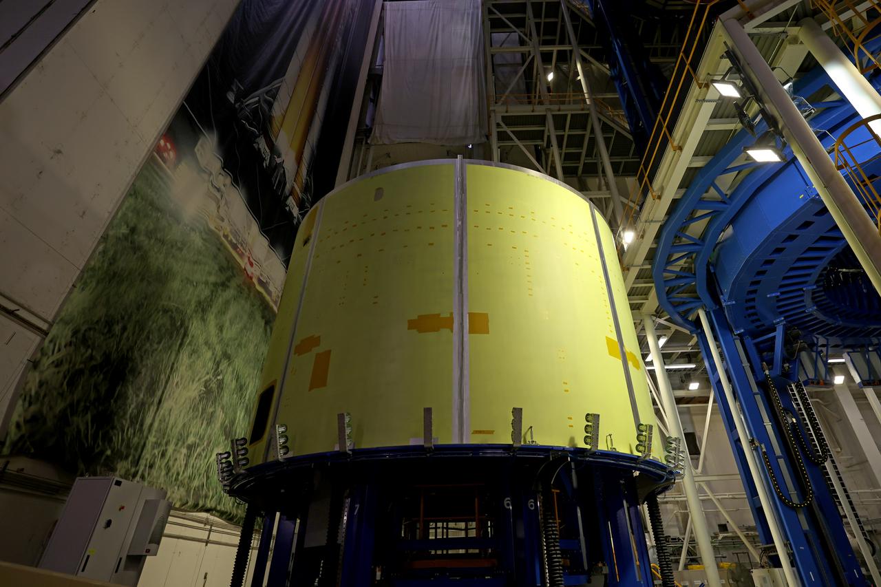 Technicians at NASA’s Michoud Assembly Facility prepare to move the engine section of NASA’s Space Launch System rocket for Artemis IV to the Vertical Assembly Building for the next step in production. This hardware is the first large piece manufactured for the Artemis IV mission and makes up the lowest portion of the 212-foot-tall core stage. When complete, the engine section will house the four RS-25 engines and include vital systems for mounting, controlling and delivering fuel from the propellant tanks to the rocket’s engines. Together with its four RS-25 engines and its twin solid rocket boosters, it will produce 8.8 million pounds of thrust to send NASA’s Orion spacecraft, astronauts, and supplies beyond Earth’s orbit to the Moon and, ultimately, Mars. Offering more payload mass, volume capability, and energy to speed missions through space, the SLS rocket, along with NASA’s Gateway in lunar orbit, the Human Landing System, and Orion spacecraft, is part of NASA’s backbone for deep space exploration and the Artemis lunar program. No other rocket is capable of carrying astronauts in Orion around the Moon in a single mission. Photographed on Thursday, May 12, 2022. Image credit: NASA/Michael DeMocker